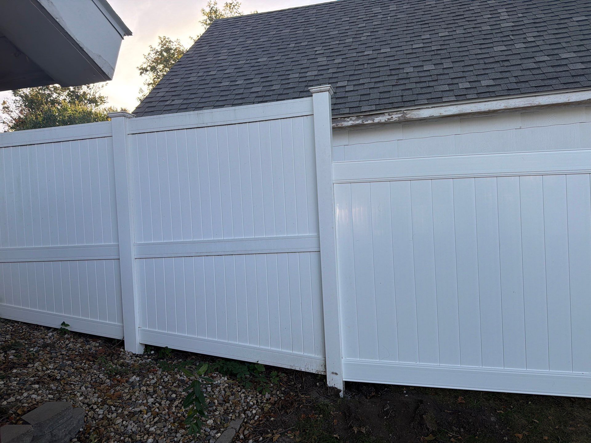 White Vinyl Privacy Fence and Gate Installation in Grundy Center by Perfect Picket Fence and Stain