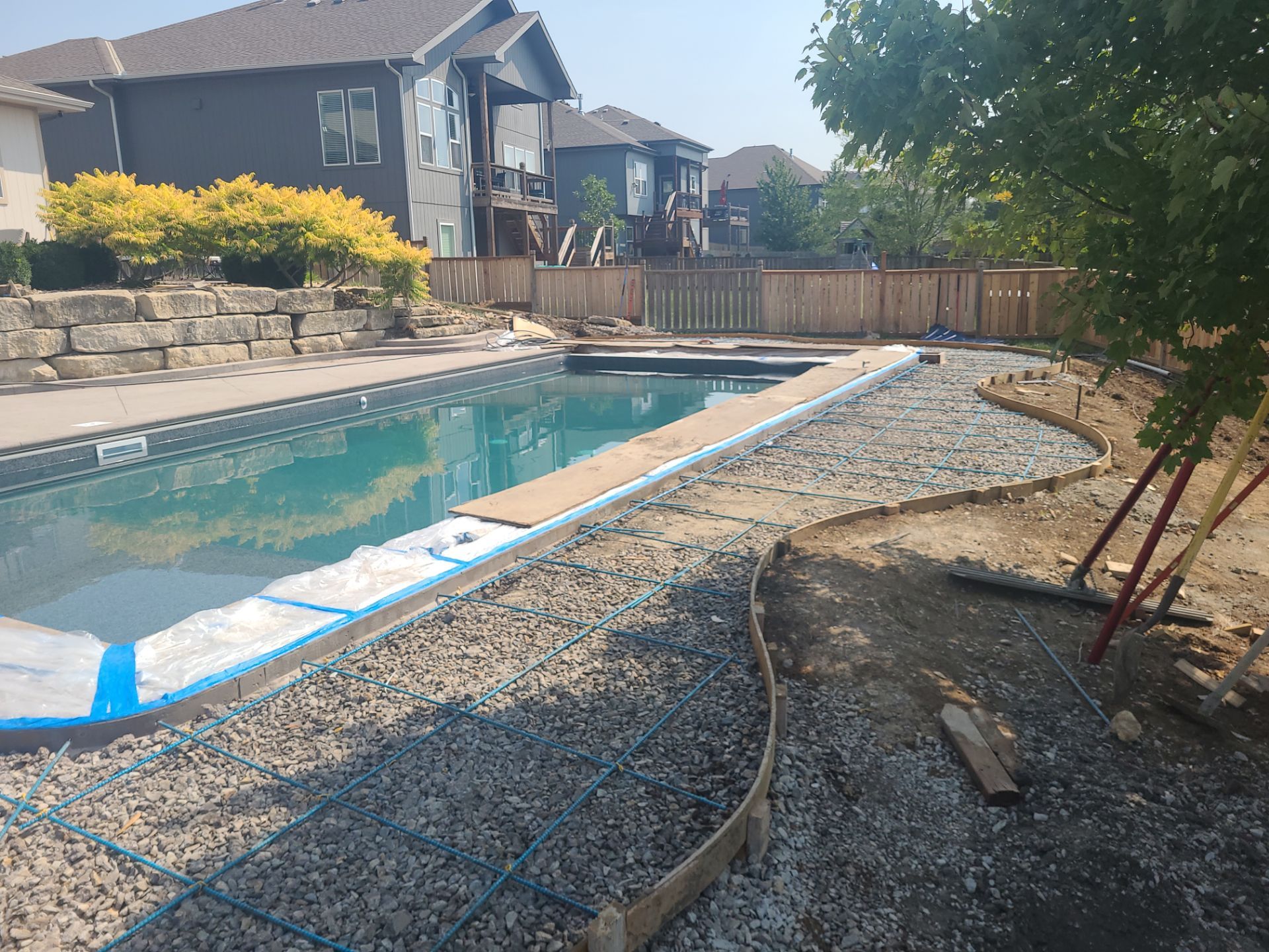 Back Yard Pool Patio by LAND ESCAPES LLC