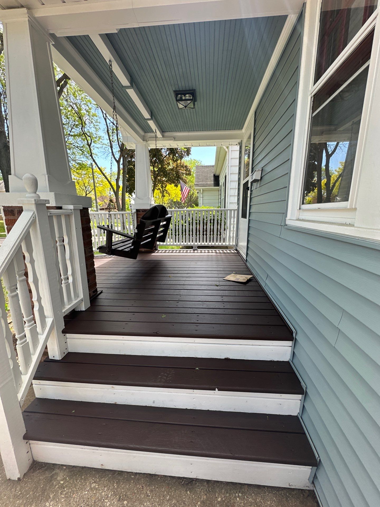 Exterior Porch Restoration and Privacy Fence Staining in Wauwatosa by OCS Contracting Services