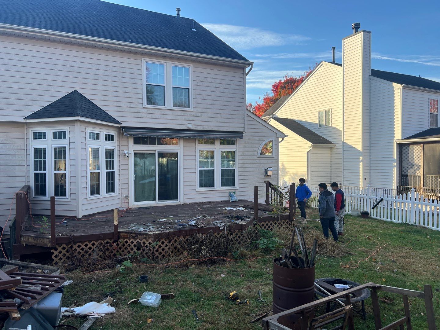 Custom Screened-In Porch with Stamped Concrete Patio in Warrenton by Jakari Restoration & Construction LLC