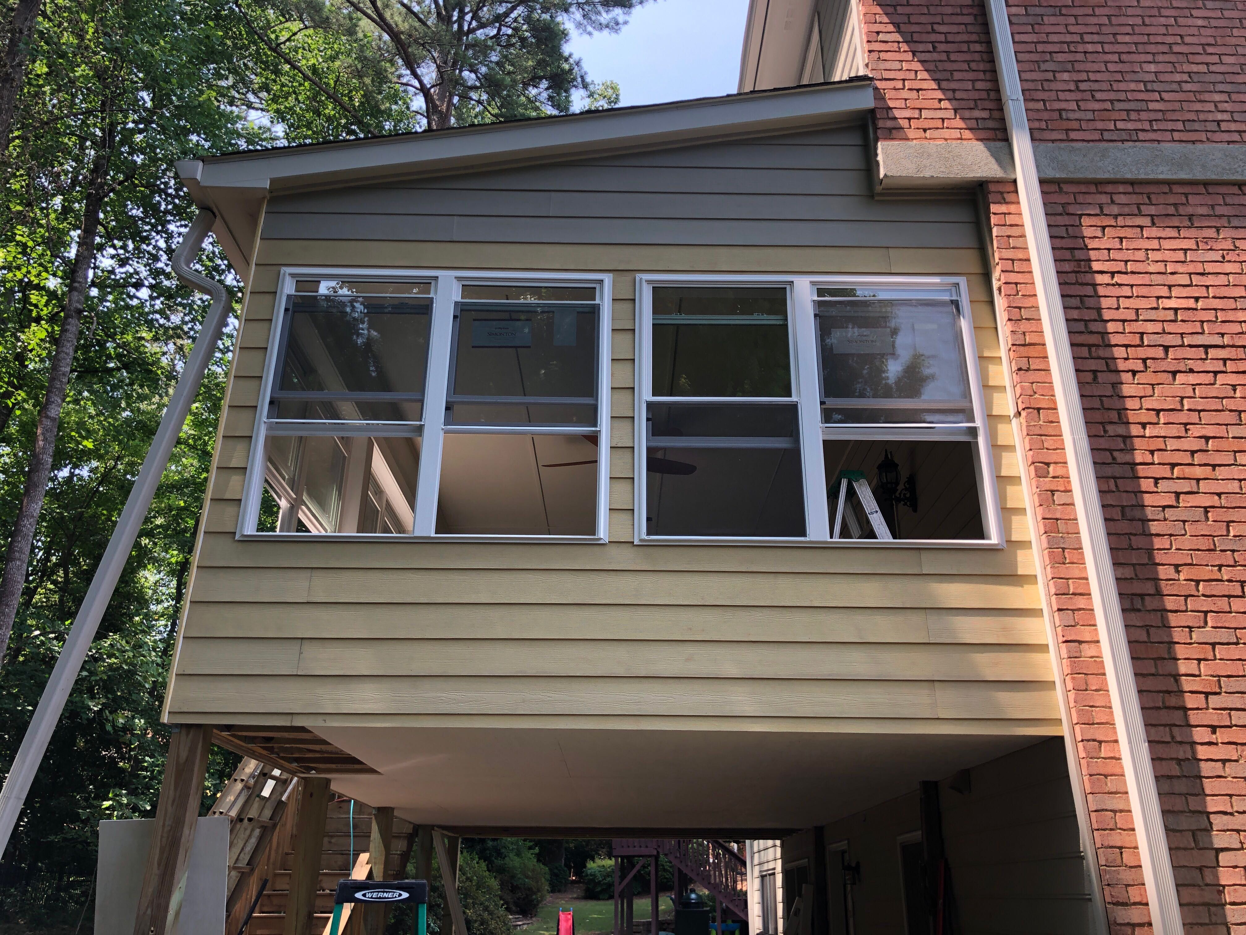 Second-Story Sunroom Addition and Screened Porch Conversion in Dunwoody by Swift Home Renovations 