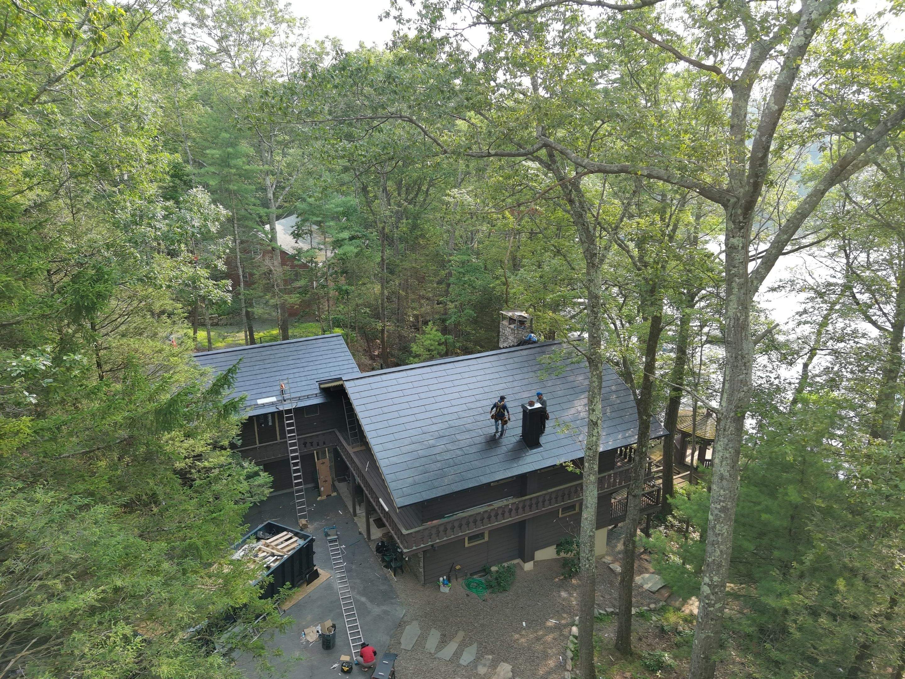 Stunning Tesla Solar Roof Cabin in the Woods by American Home Contractors