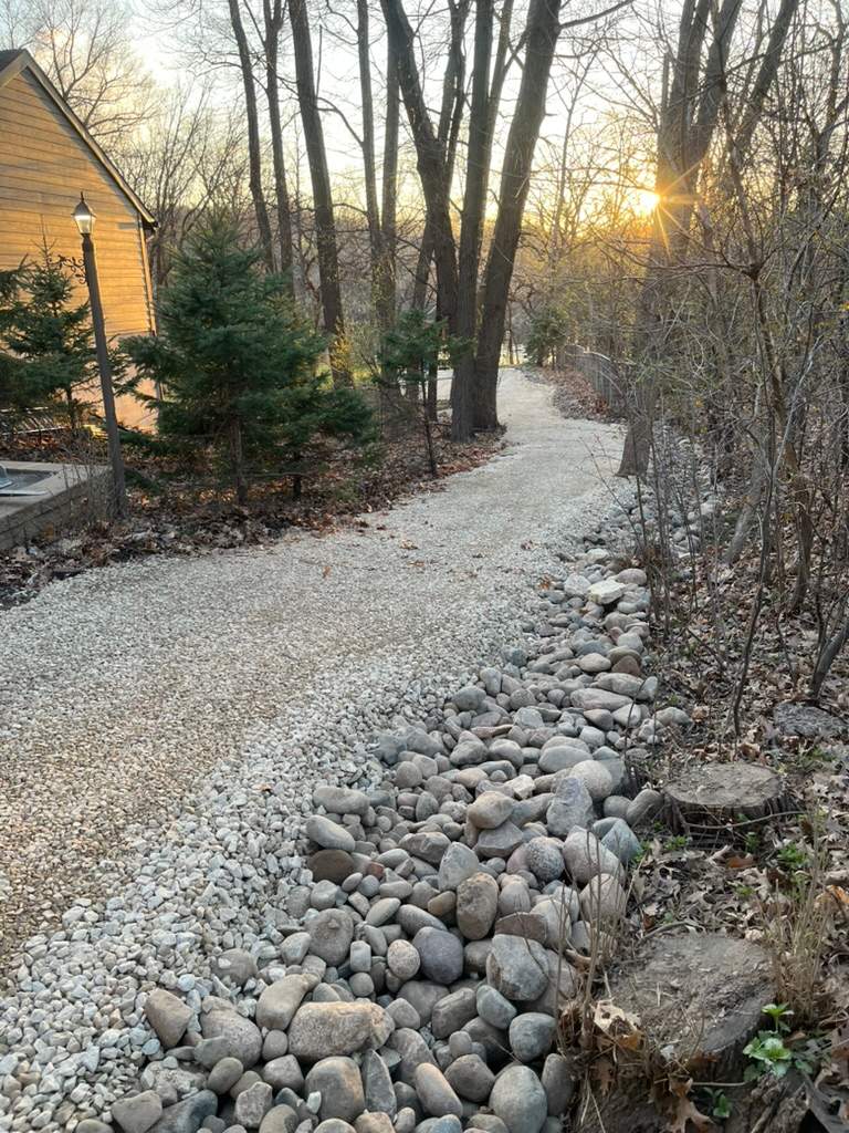 Limestone Boulder Wall  by Sota landscaping