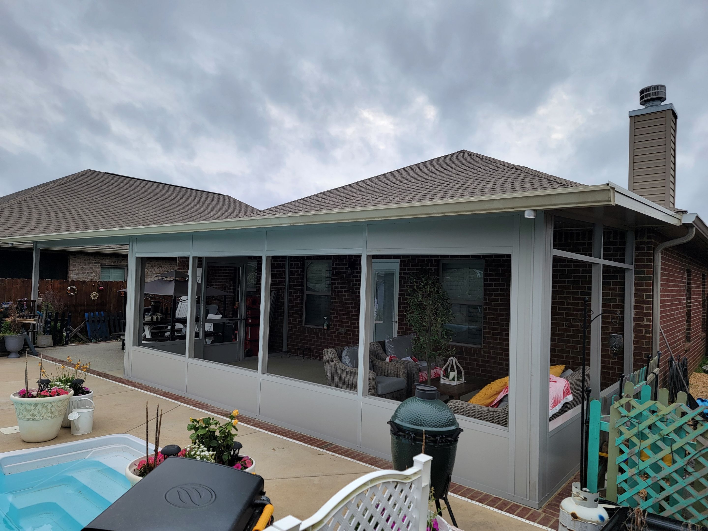 Poolside Screen Room & Patio Cover in Gulf Breeze by Titan Sunrooms