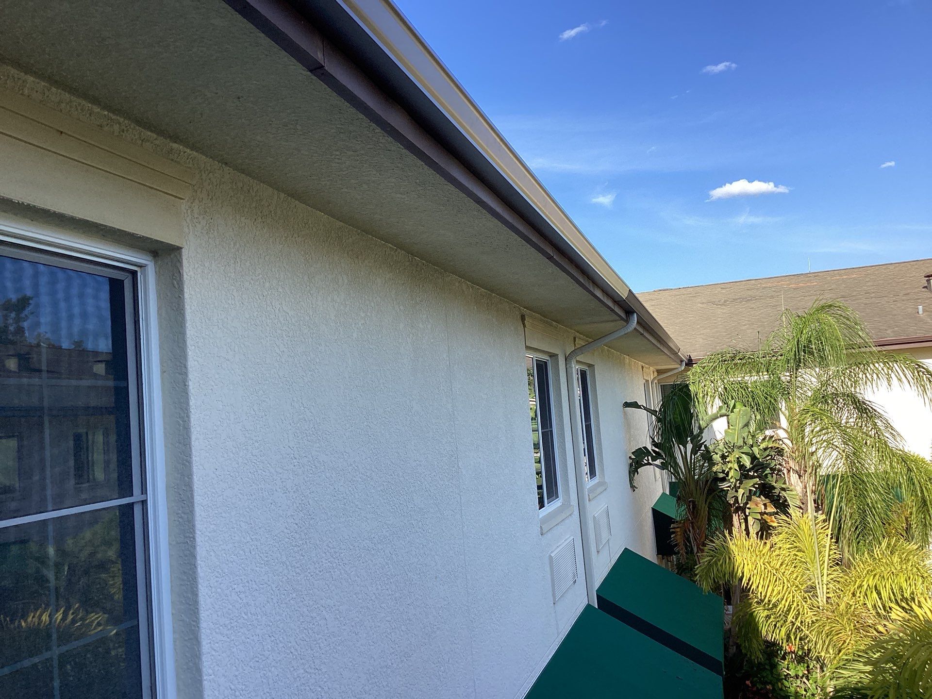 Musket Brown Seamless Gutters using Musket Brown Seamless Gutters in Capen Coral FL by Gutter Professors