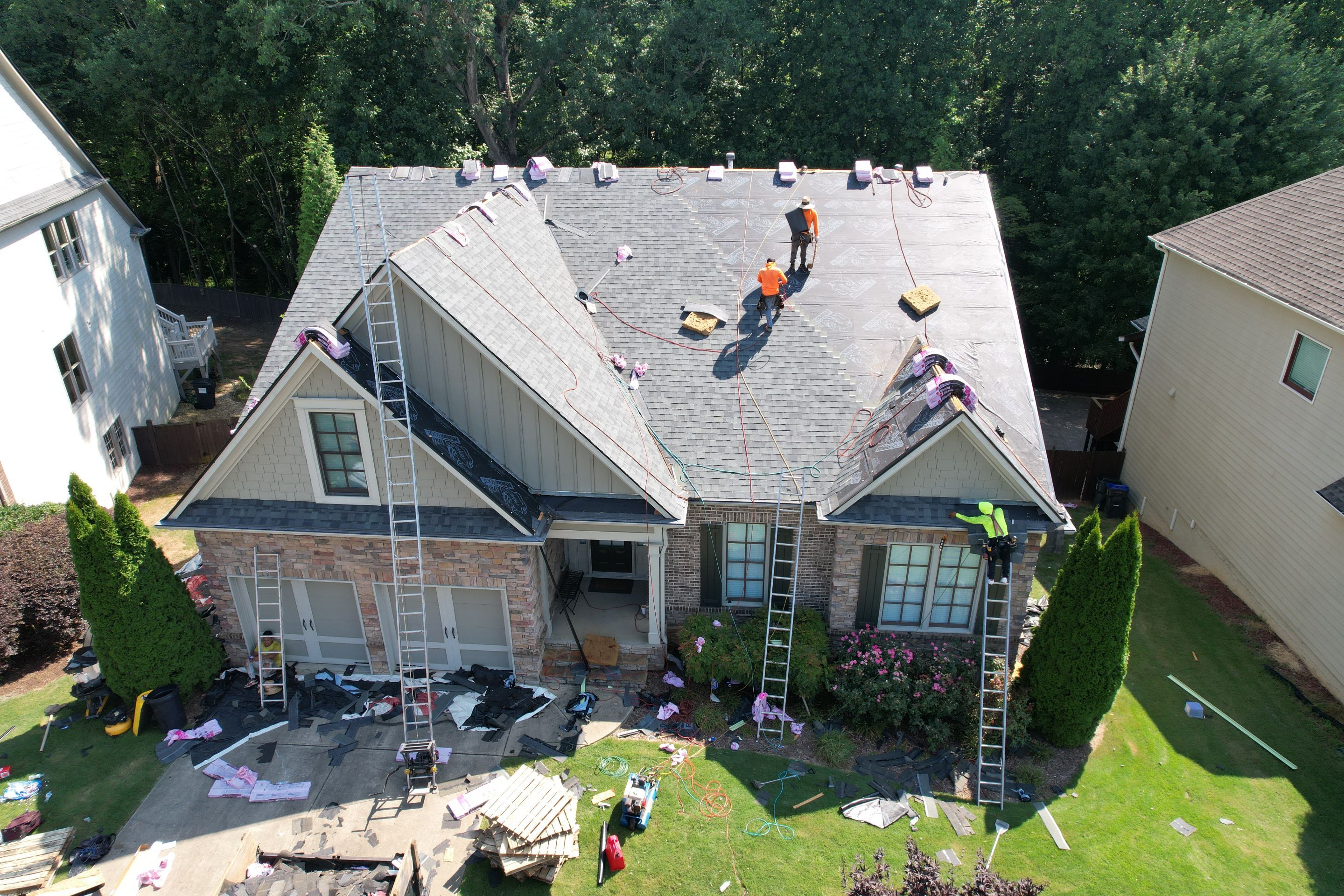 Residential Roofing Installation using Owens Corning Quary Gray by Inspector Roofing and Restoration