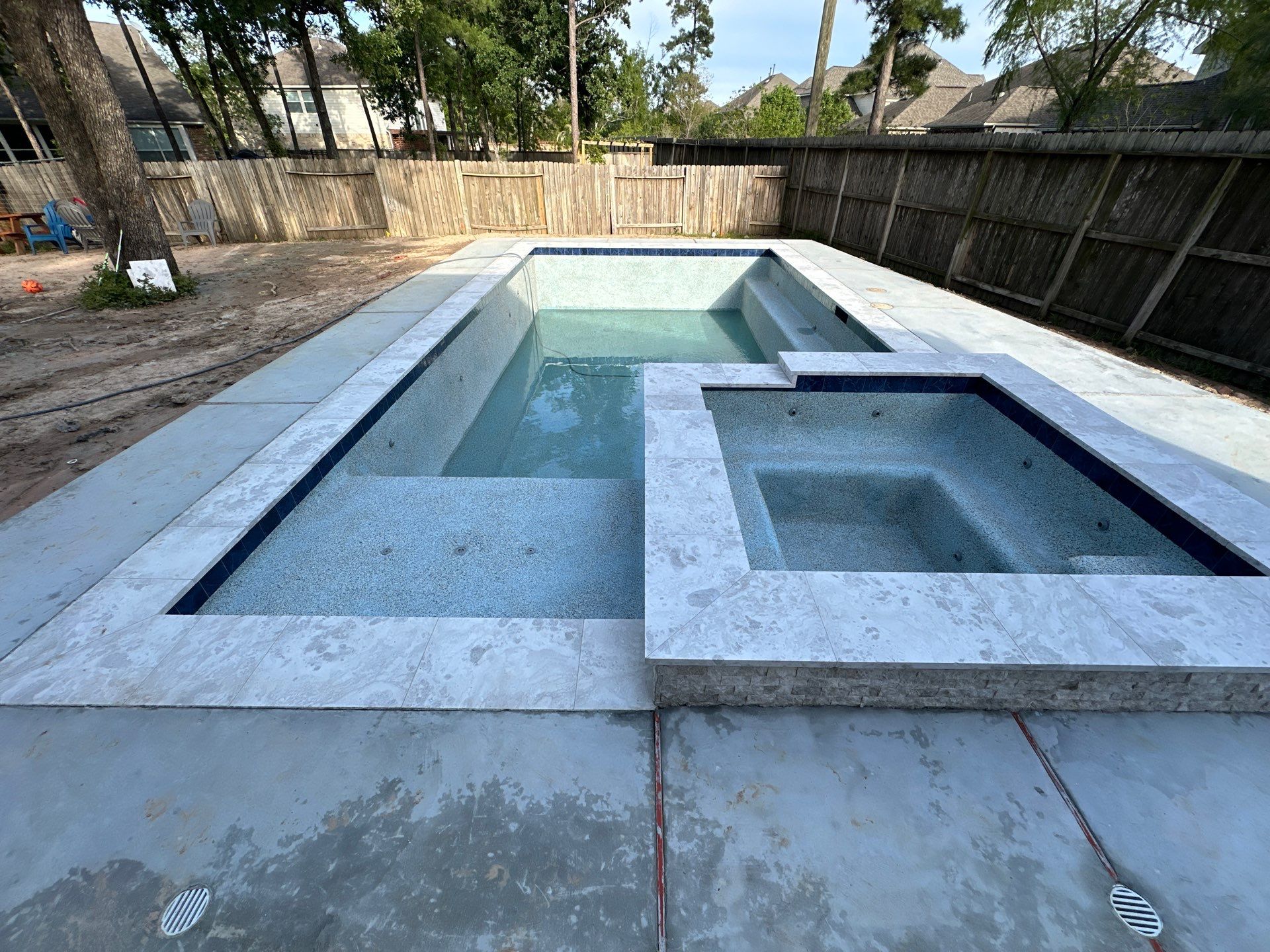 Pool, Patio Cover and Summer Kitchen in Creekside by SophAlx LLC
