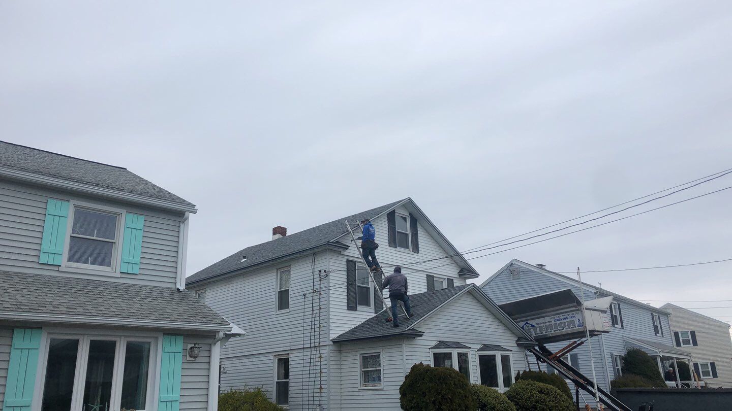 Residential Roofing Installation using Owens Corning Duration Slatestone Gray by A Plus Exterior