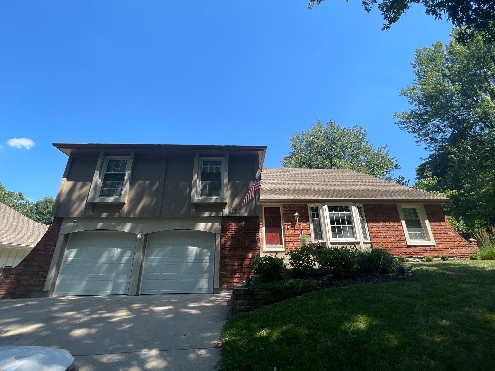Complete Kansas City Exterior Remodel With IKO Roofing and Craneboard Siding by EEC Windows, Siding & Roofing