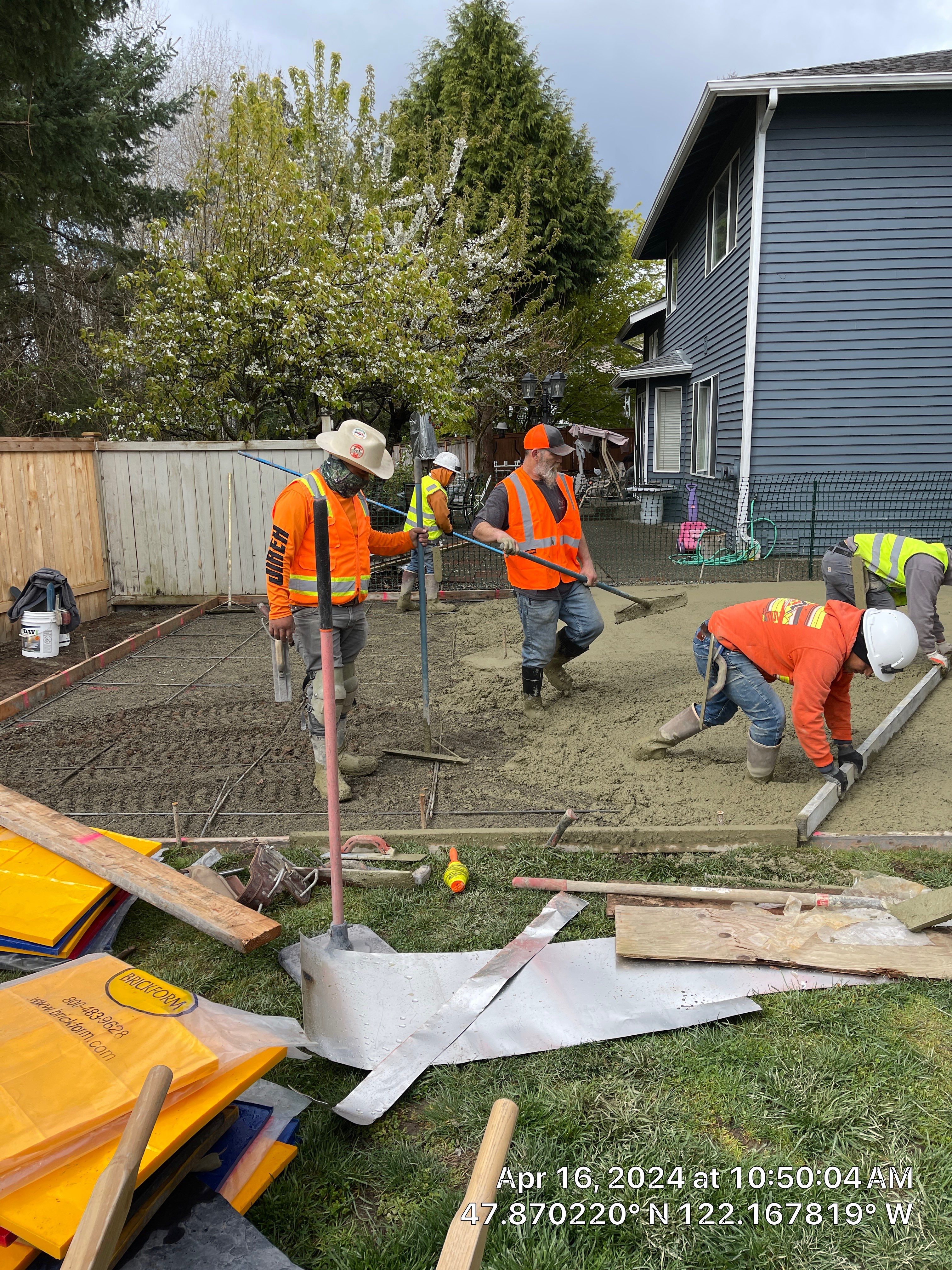 Benedict | Stamped Concrete Back Patio by Jireh Asphalt & Concrete Inc 