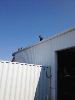 Gutter Installation using 6" K-Style Aluminum Gutter at Tracy Chevrolet