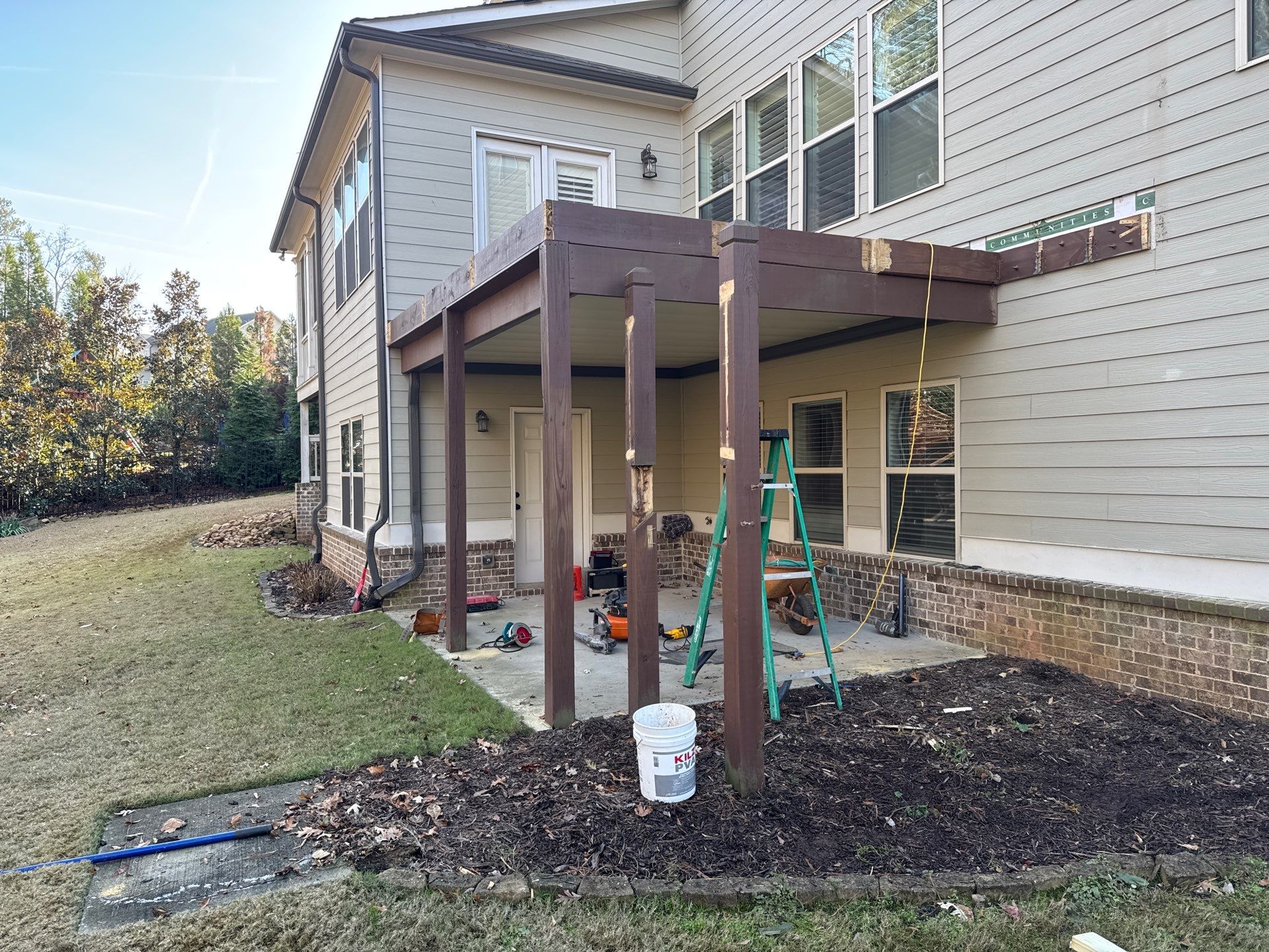 Custom Pressure-Treated Deck with Metal Balusters in Marietta by Swift Home Renovations