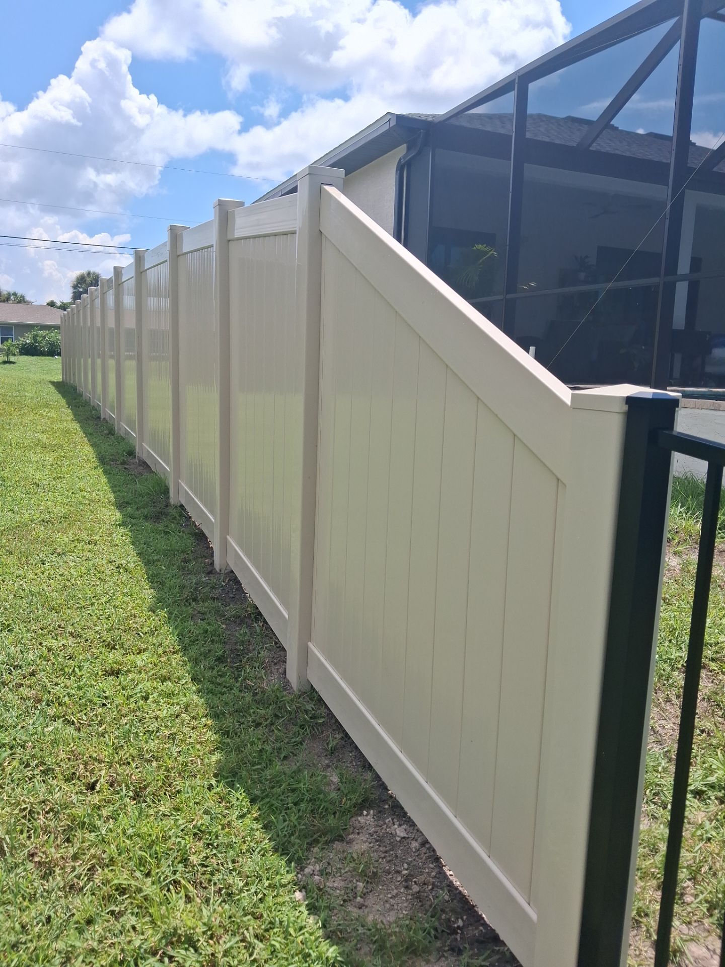 Vinyl Privacy Fencing and Aluminum Pool Security Installation in Port Charlotte by True Fence LLC