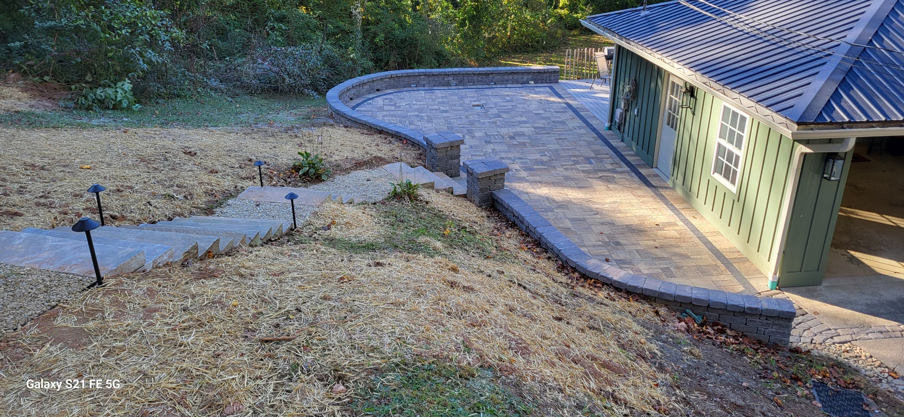 Patio & Fire Pit Retreat by B&B Landscaping