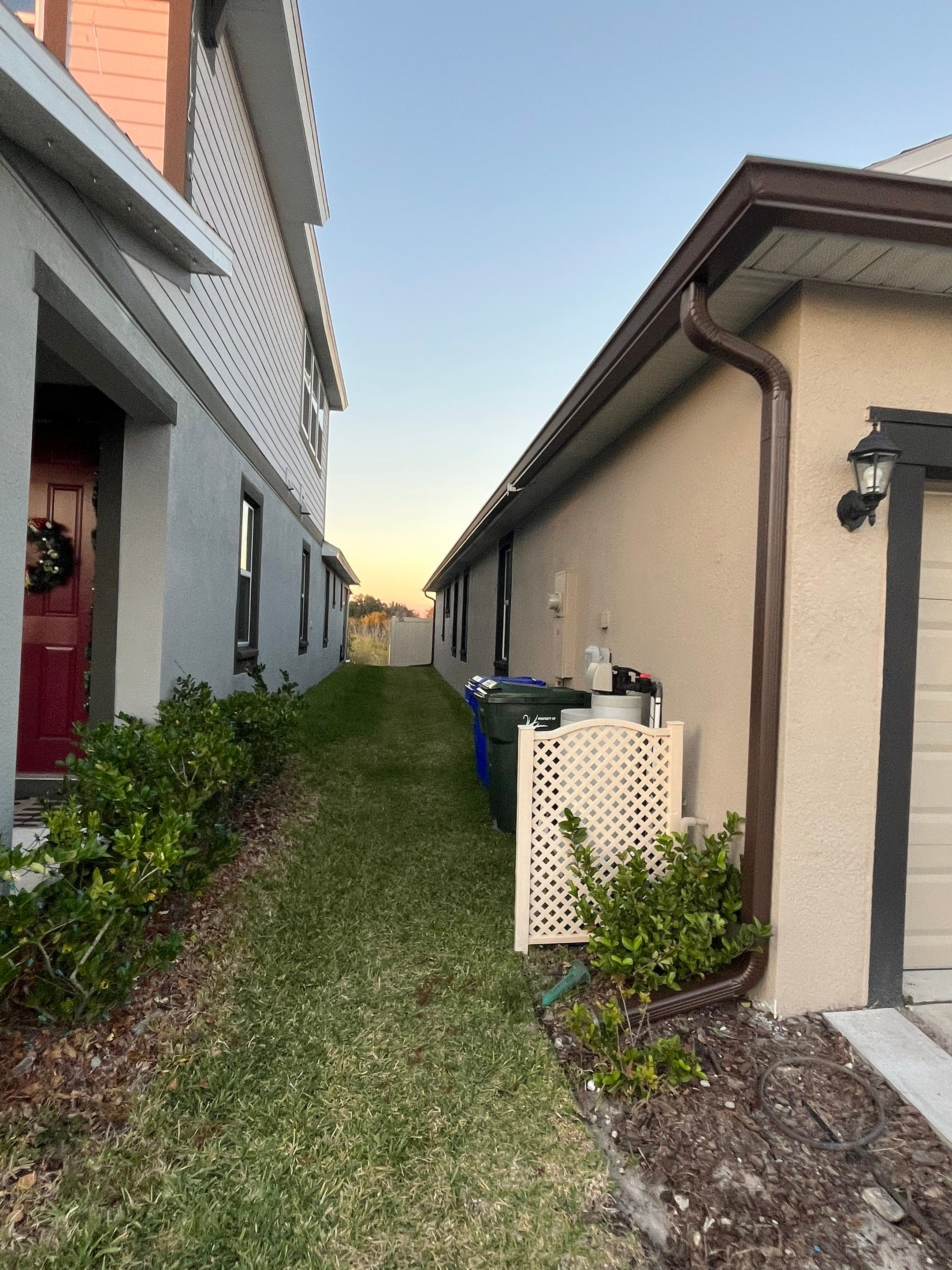 3X4 elbow Downspouts using Musket Brown Seamless Gutters in Lakeland FL by Gutter Professors