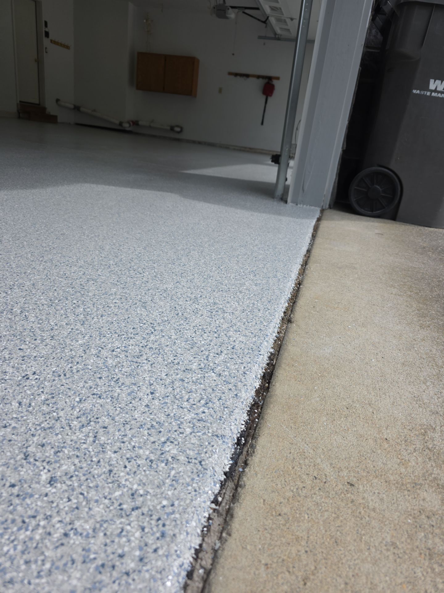 Garage Transformation using 1/8 Tidal Wave by Croc Coatings, LLC