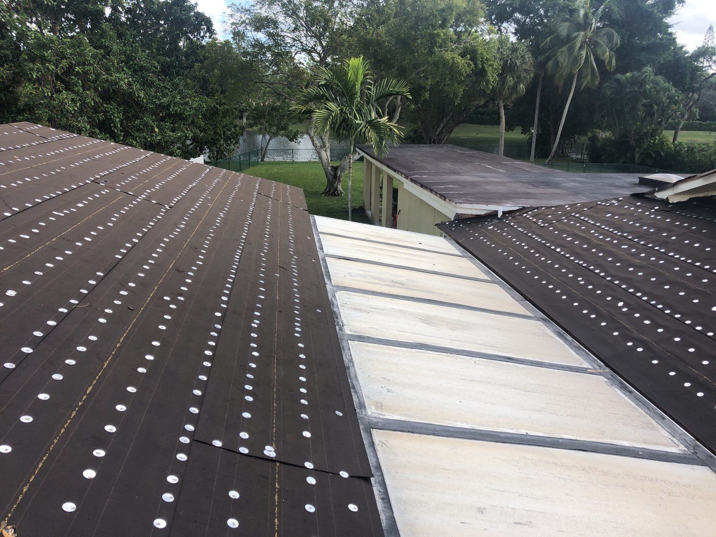 Residential Roofing Installation using 1" Nail strip metal roof by BLUES BROTHERS ROOFING