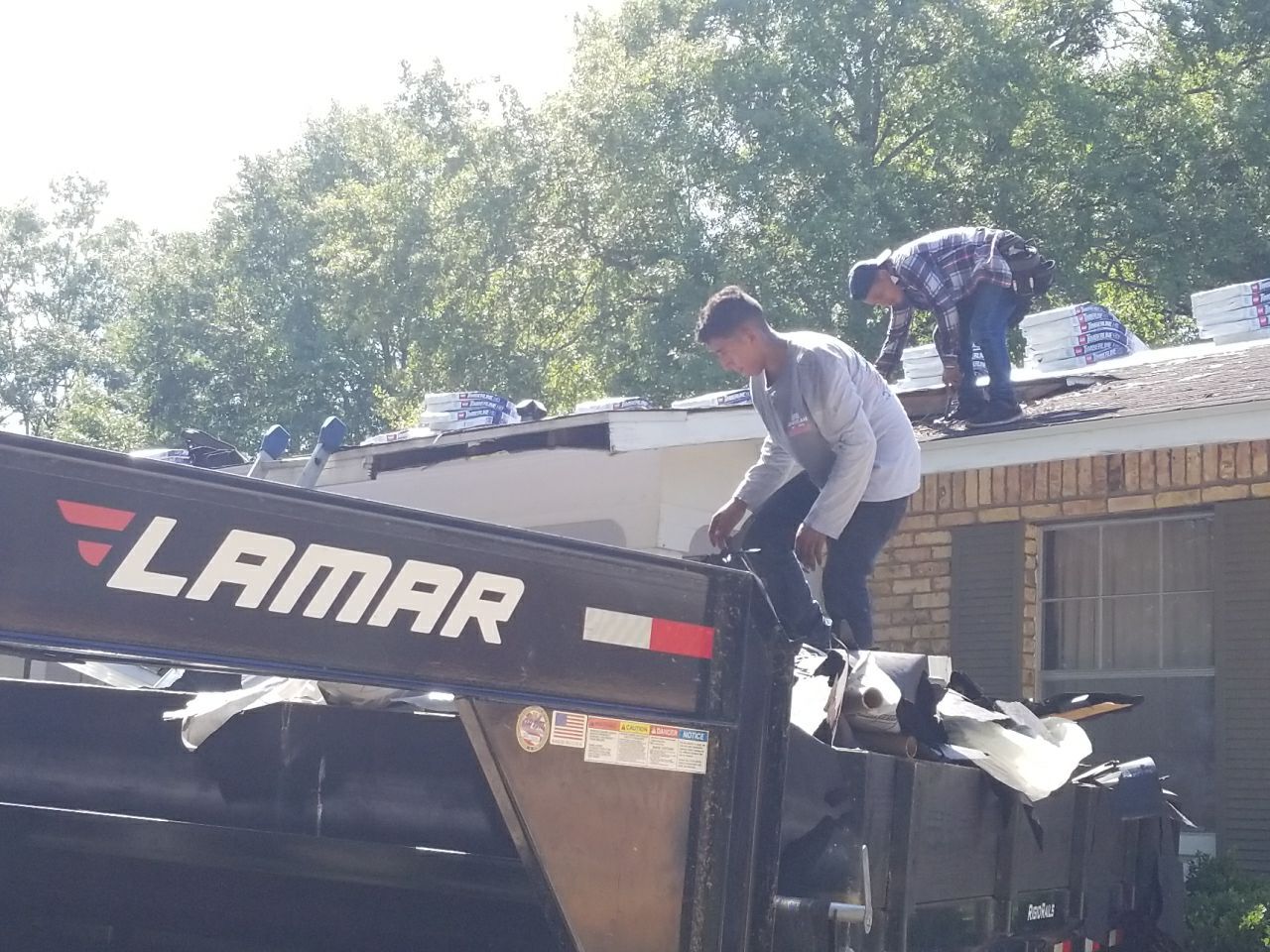 Residential Roofing Installation using Roof Replacement by American Roofing & Construction LLC