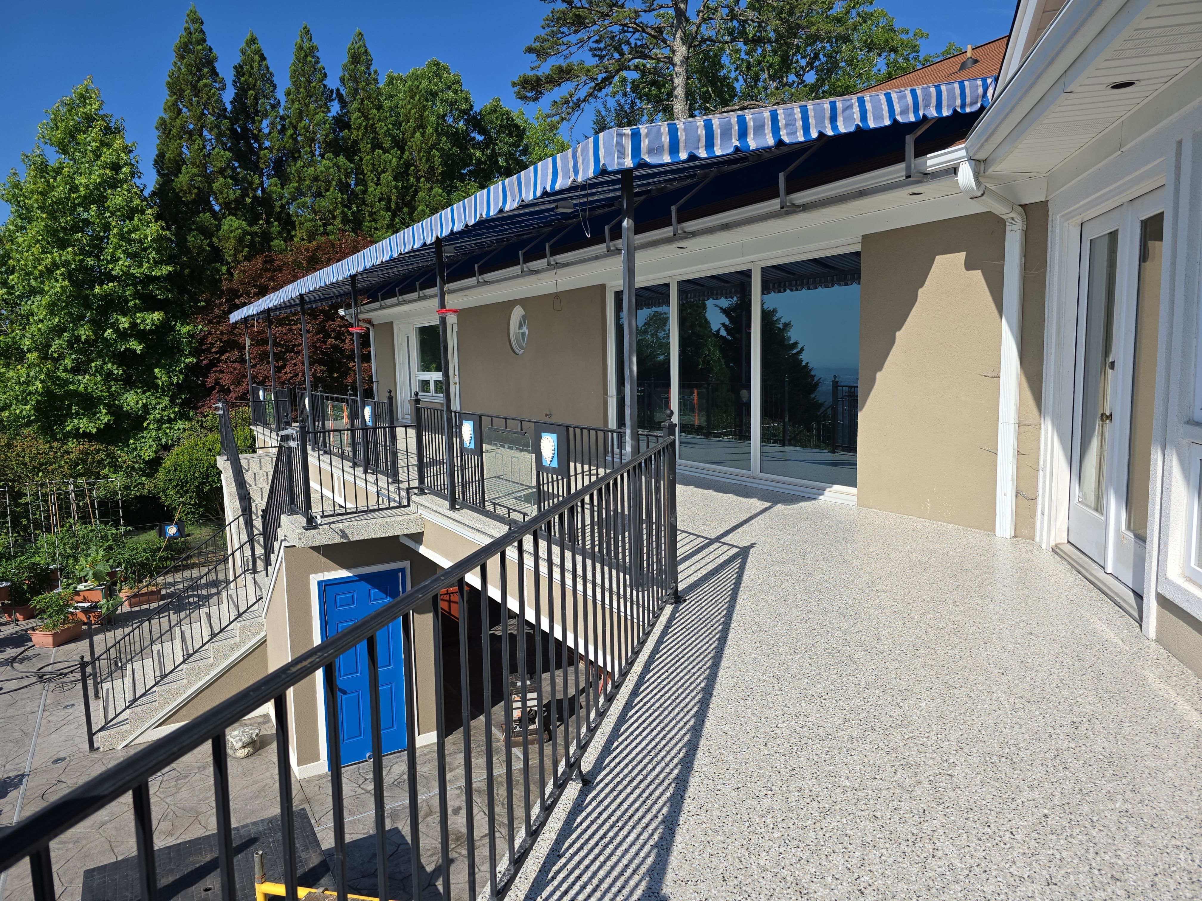 Epic Patio Remodel with a stunning view! by Elite Floor Solutions