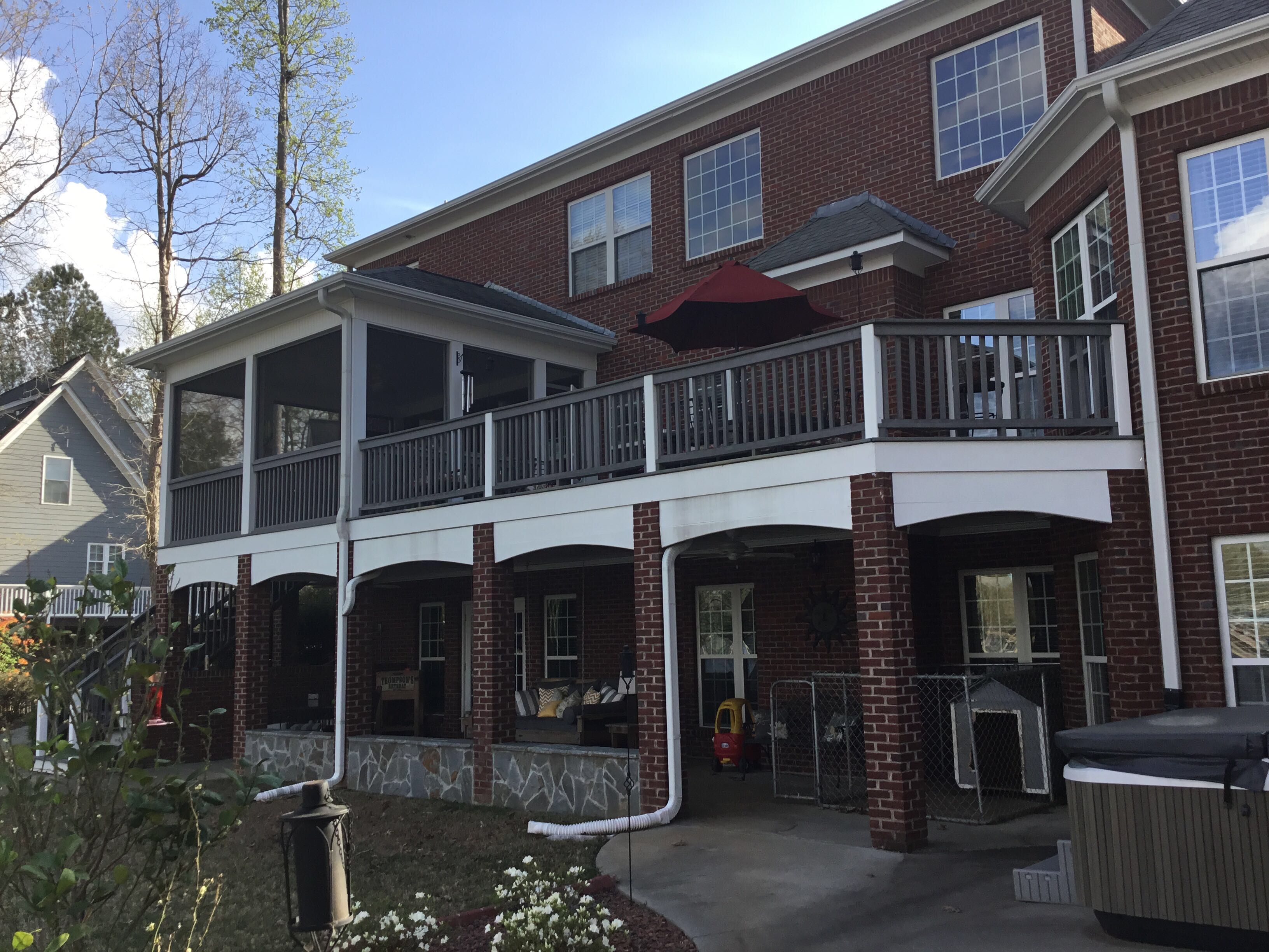 Elevated Composite Deck and Screened Porch Construction in Newnan by Swift Home Renovations