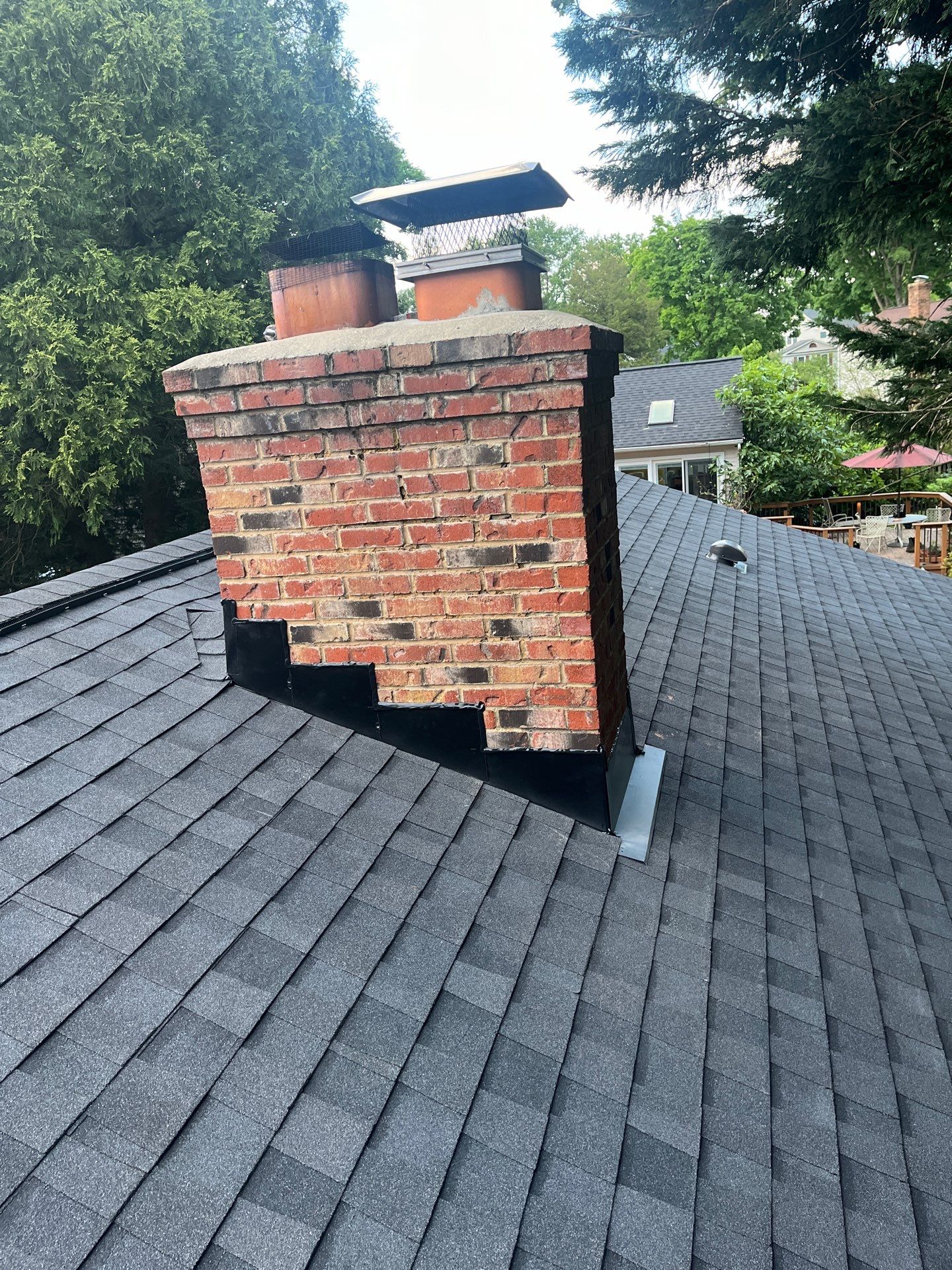 Burke: CertainTeed Landmark Designer Shingles in Moire Black by RM Banning, Inc.