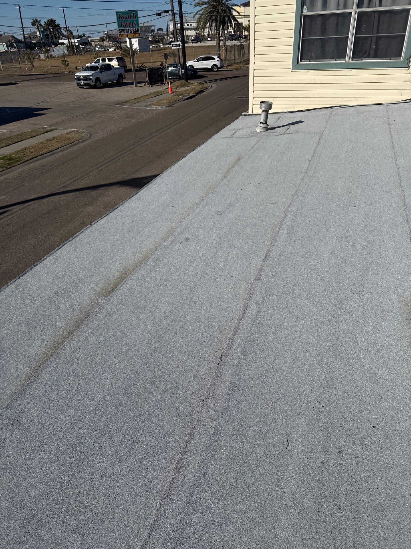 Mustang Island Flat Top by Bayfront Roofing and Construction