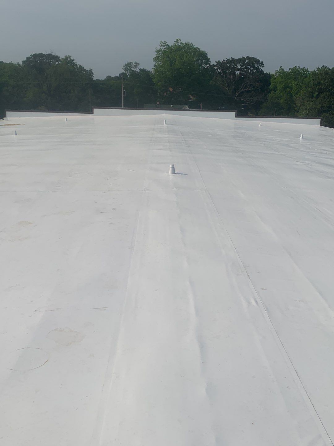 Commercial Roofing Installation using 50 mil PVC by Hostetler Roofing
