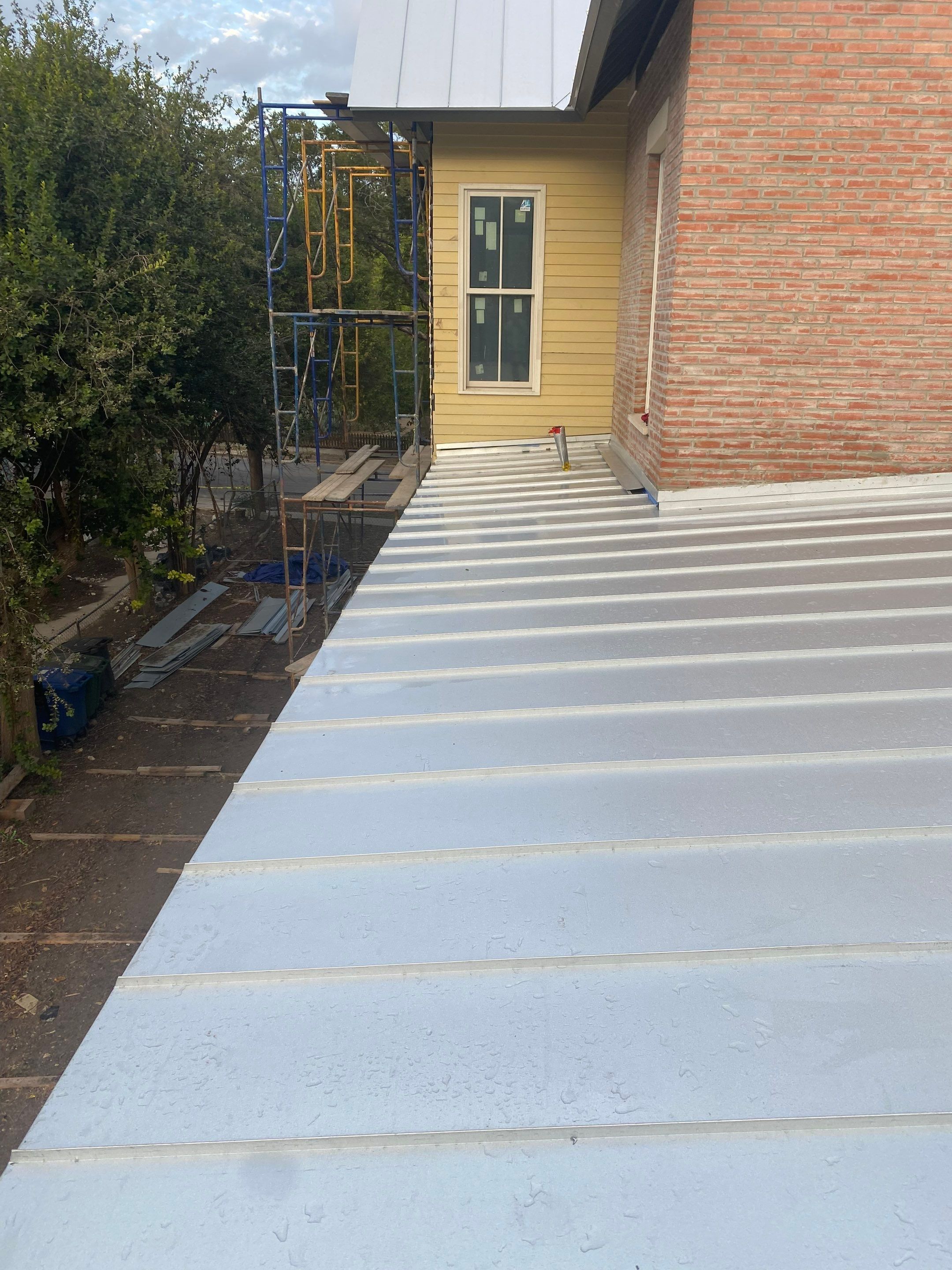 Residential Metal Roof Installation using McElroy Metal by Premier Roofing and Contracting