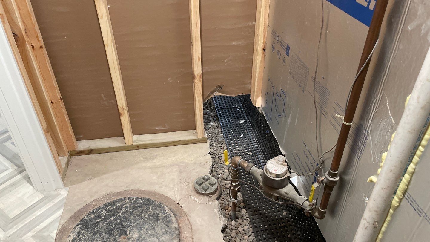 Interior Drain Tile & Buried Discharge in St. Anthony, MN by Waterproofing Northeast