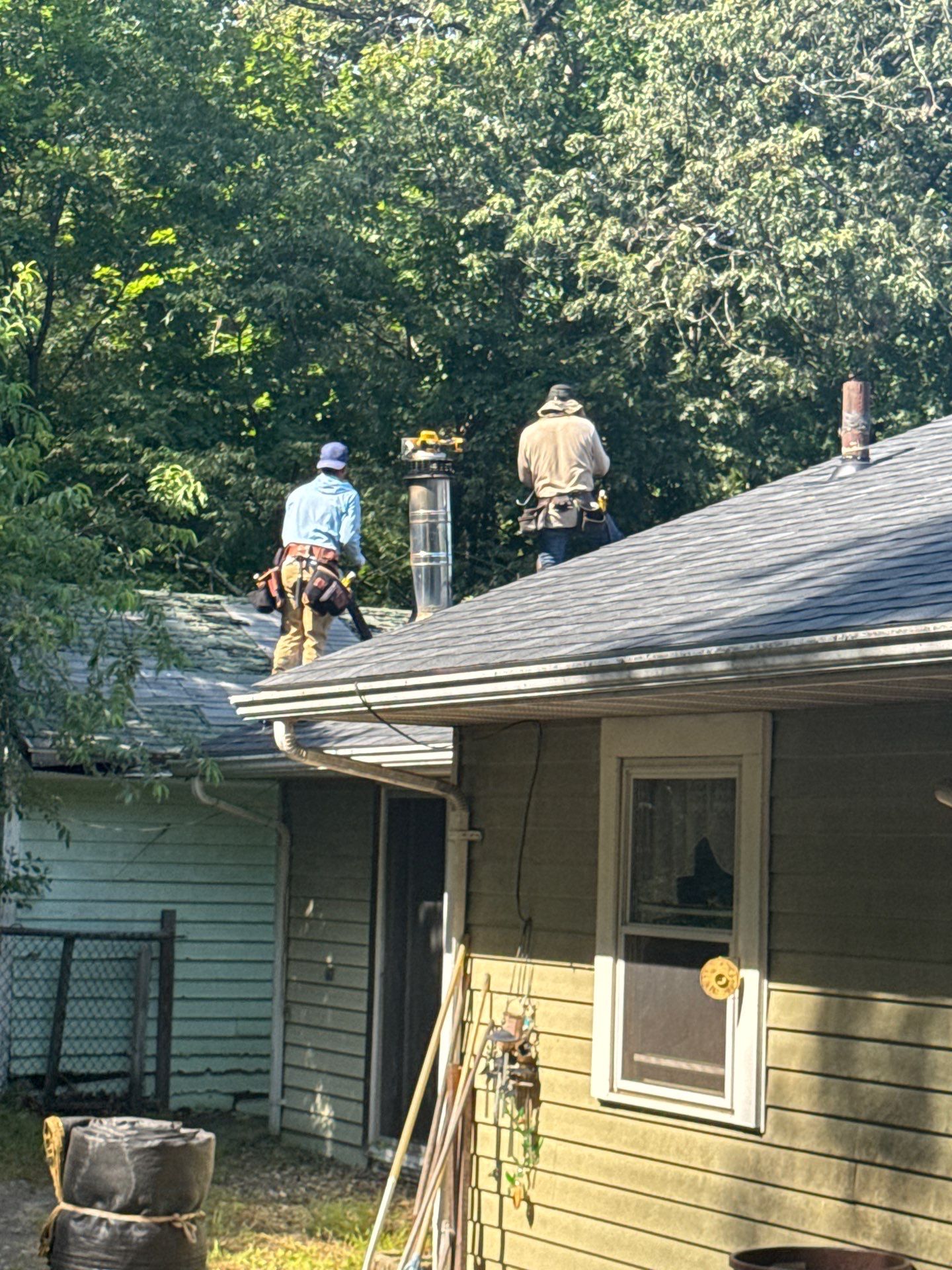 Onyx Black Roof Transformation in Maynard, MA by Mighty Dog Roofing of Greater Middlesex County