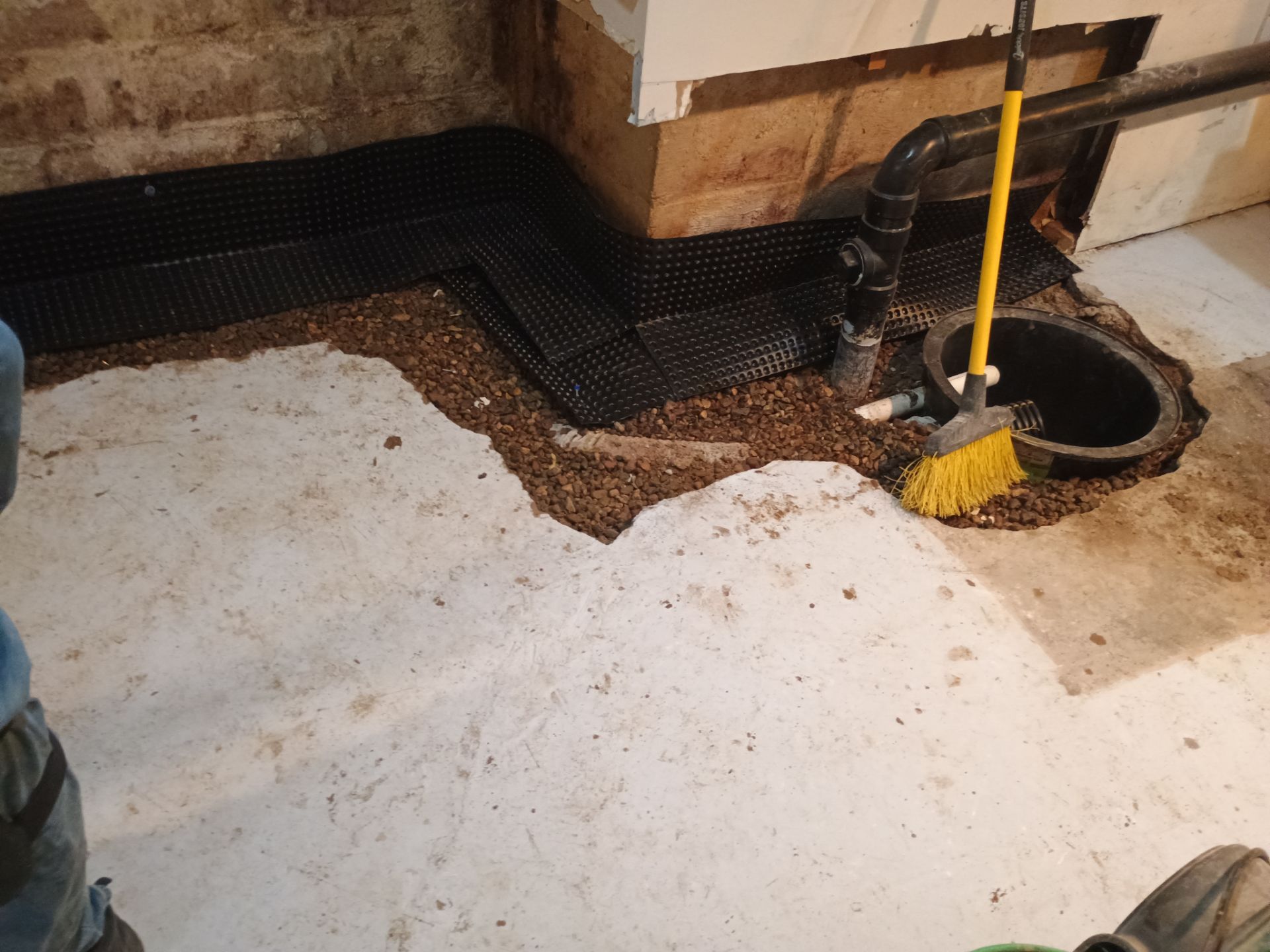 Interior Drain Tile & Sump Pump Installation in St. Paul, MN by Waterproofing Northeast