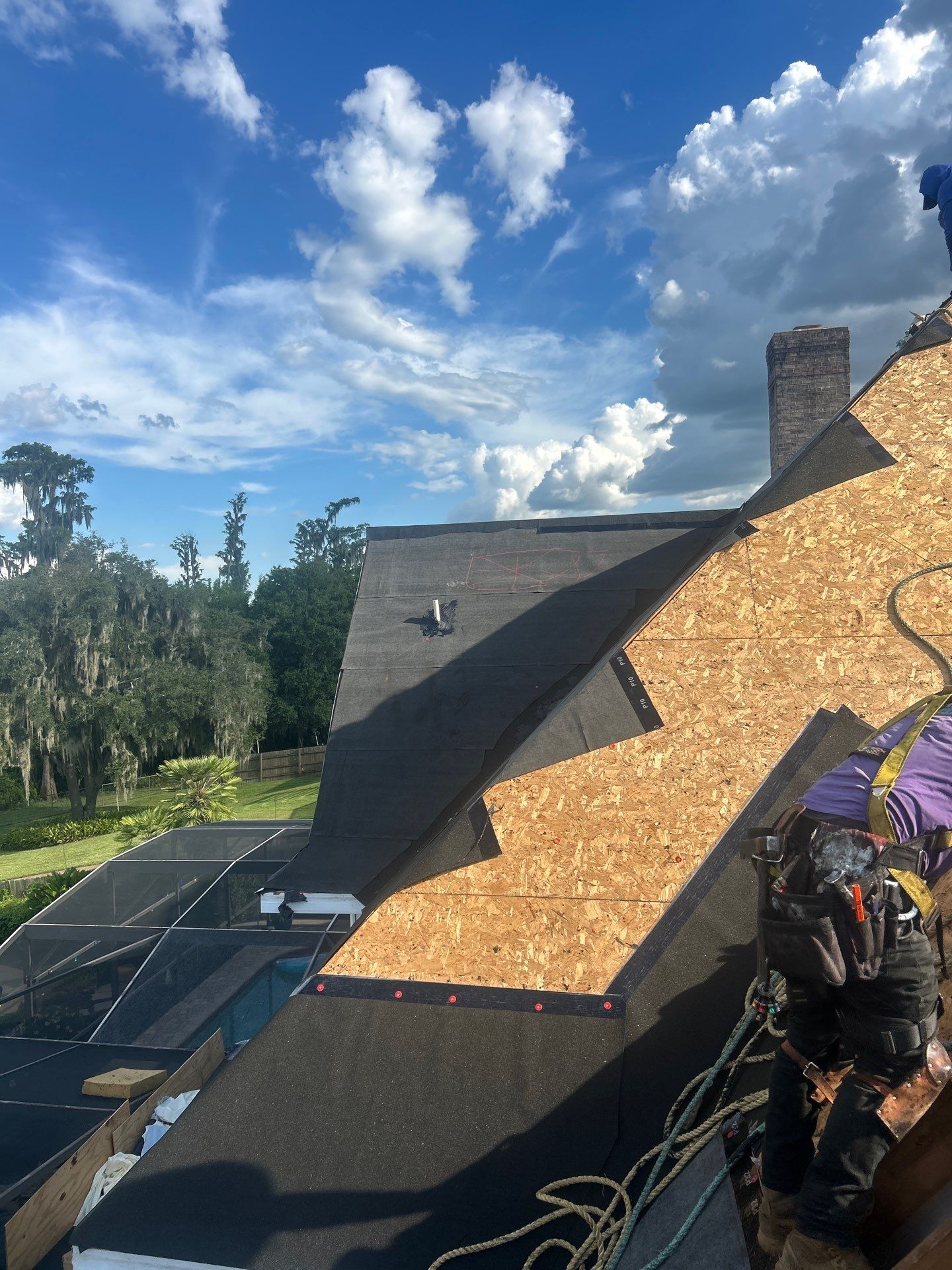 Residential Roofing Installation with Black Shadow Shingles in Clermont by Pinnacle Roofing Group