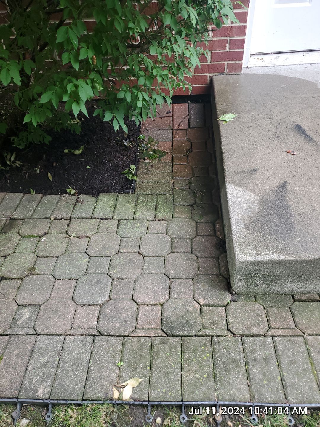 Brick paver repair, clean and seal by Northern Power Washing LLC.