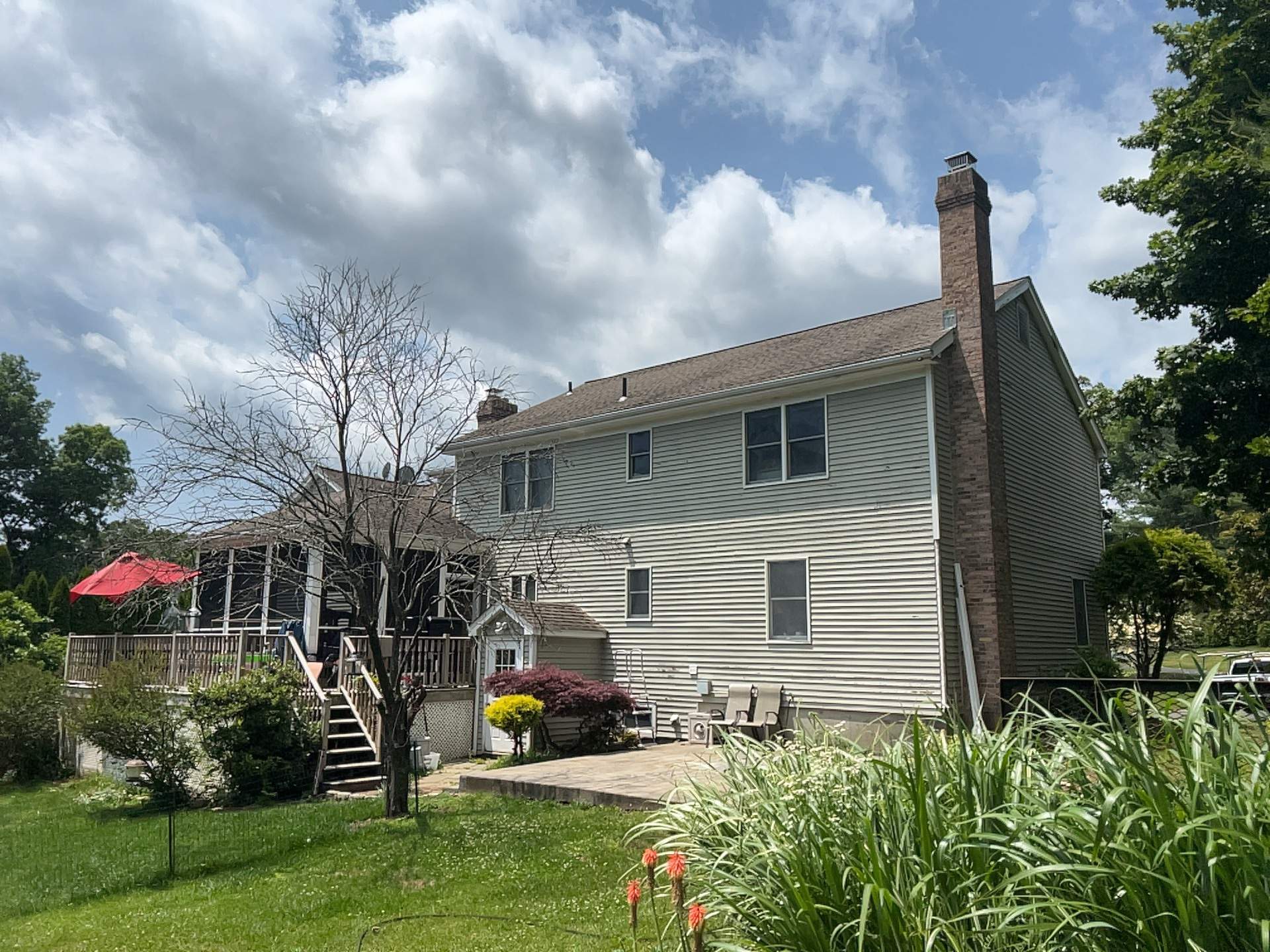 Siding Installation using Mainstreet Colonial & White gutters by A Plus Exterior