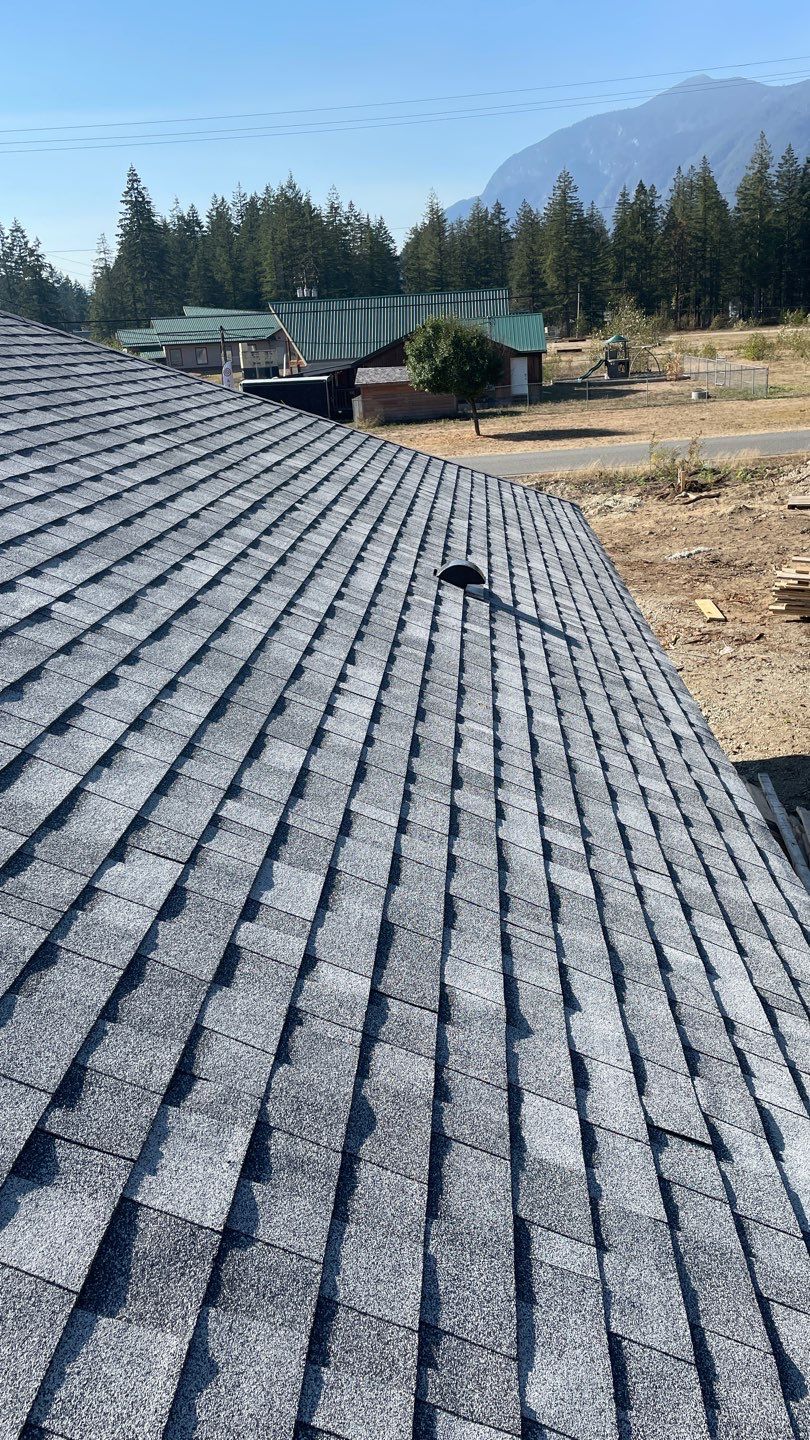 Residential Roofing Installation using OC Oakridge shingles by Top Notch Roofing Inc
