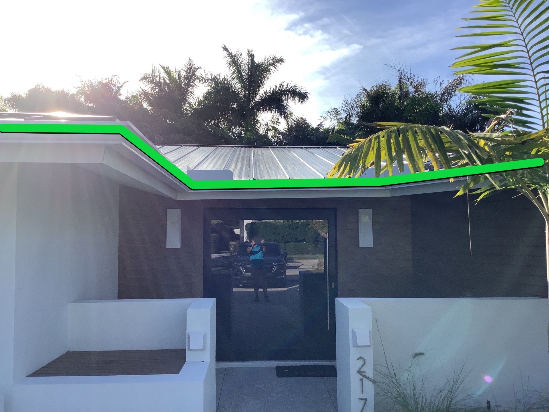 White Seamless Gutters and Downspouts in Sarasota FL by Gutter Professors