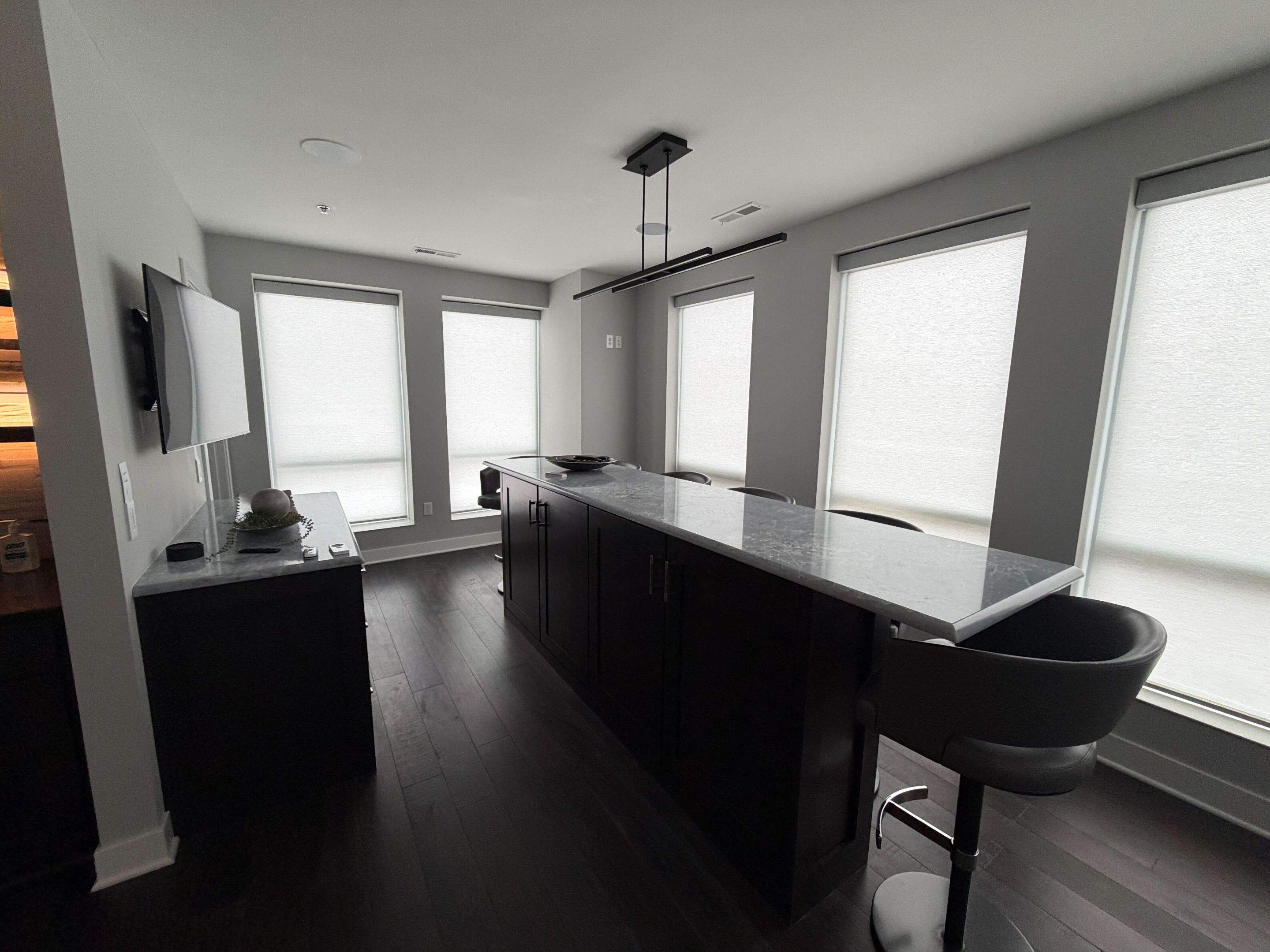 Bridge Park Penthouse: Control4 Integration of 46 Shades by Connesso