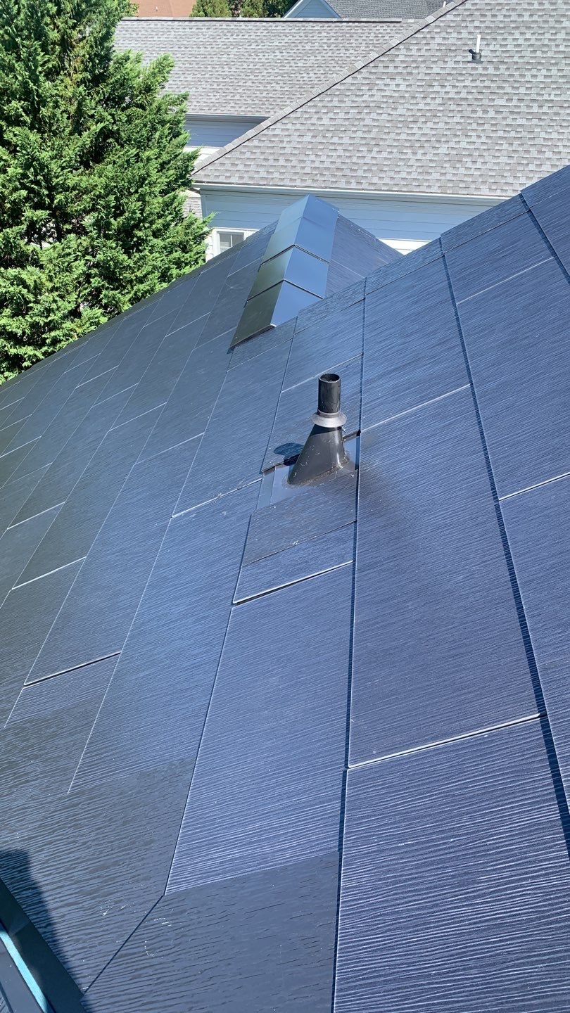 Tesla Solar Roof Replacement using Tesla Solar Roof V3 tiles by American Home Contractors