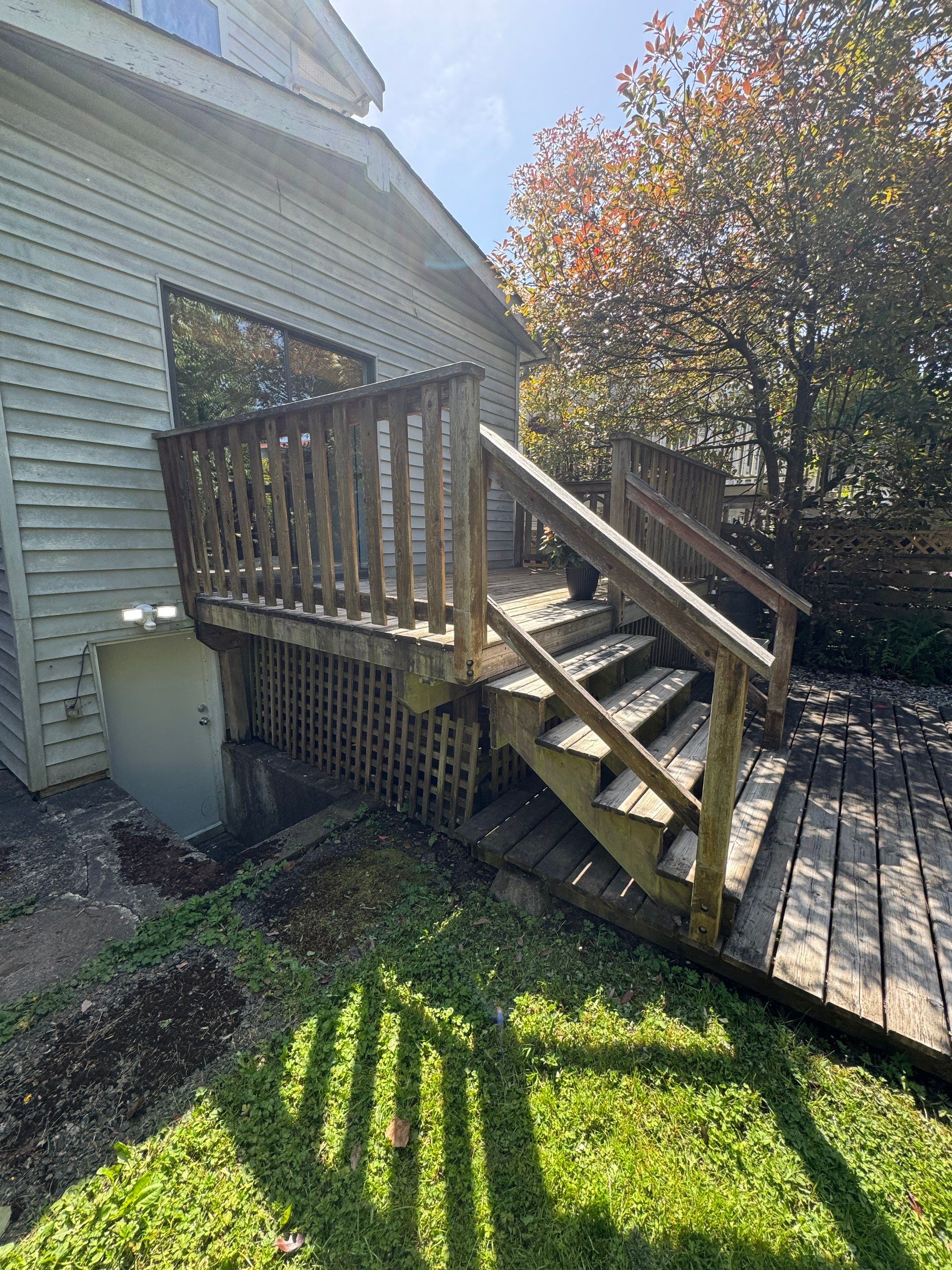 Deck Restoration: Staining Deck & Railings by YVR Construction Group