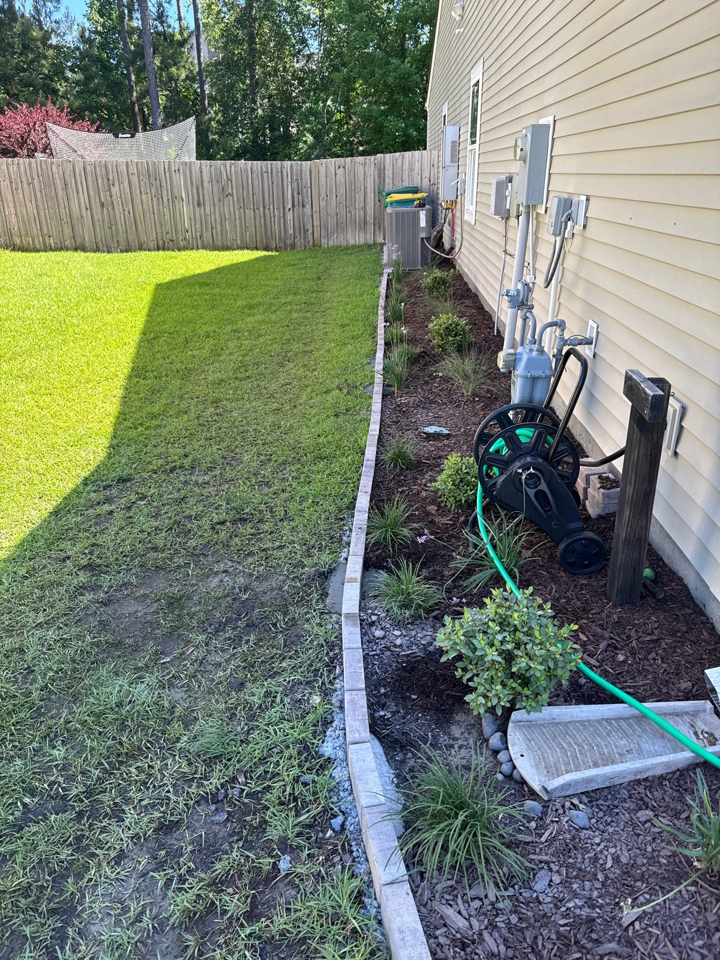 Custom Paver Landscape Edging and Garden Bed Mulching in Bluffton by Lowcountry Scapes, LLC