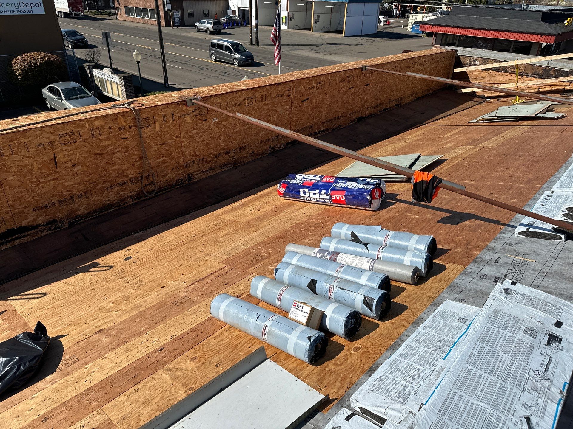 Commercial Roofing Installation using IKO Dynasty & GAF 60Mil TPO by Orezona Building & Roofing Company, Inc.
