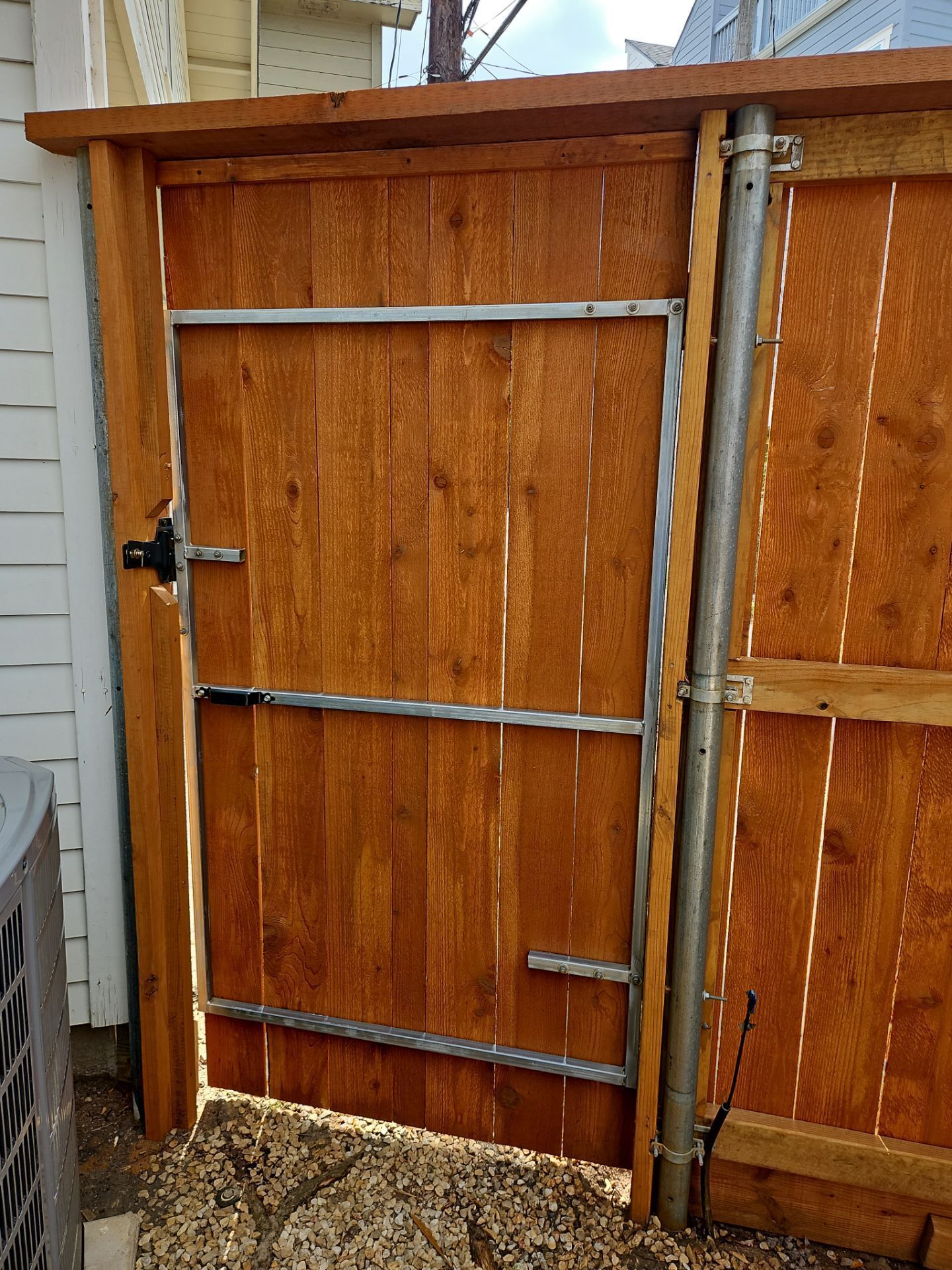 Durable Fence & Gate Installation with Premium Stain by Tim's Fences