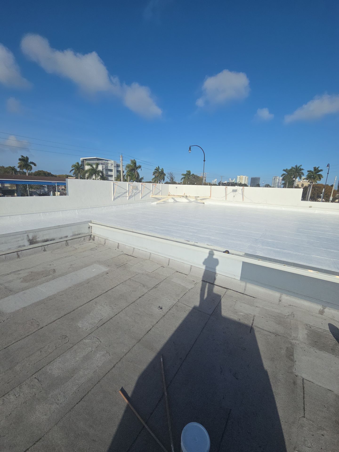 Commercial Flat Roof Restoration Using Silicone Coating in Hallandale Beach by Aastro Roofing