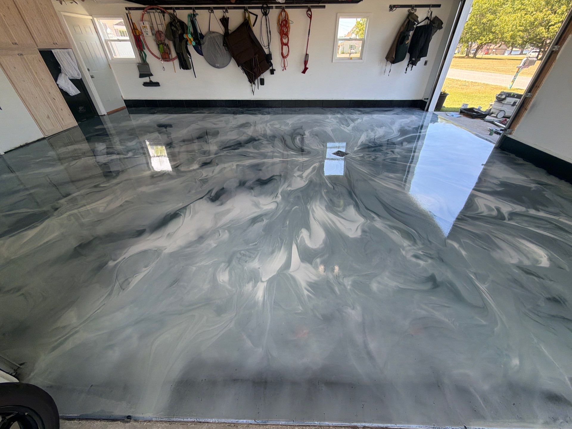 Custom Metallic Epoxy Floor and Polished Countertop Installation in Mears by Gordon Painting