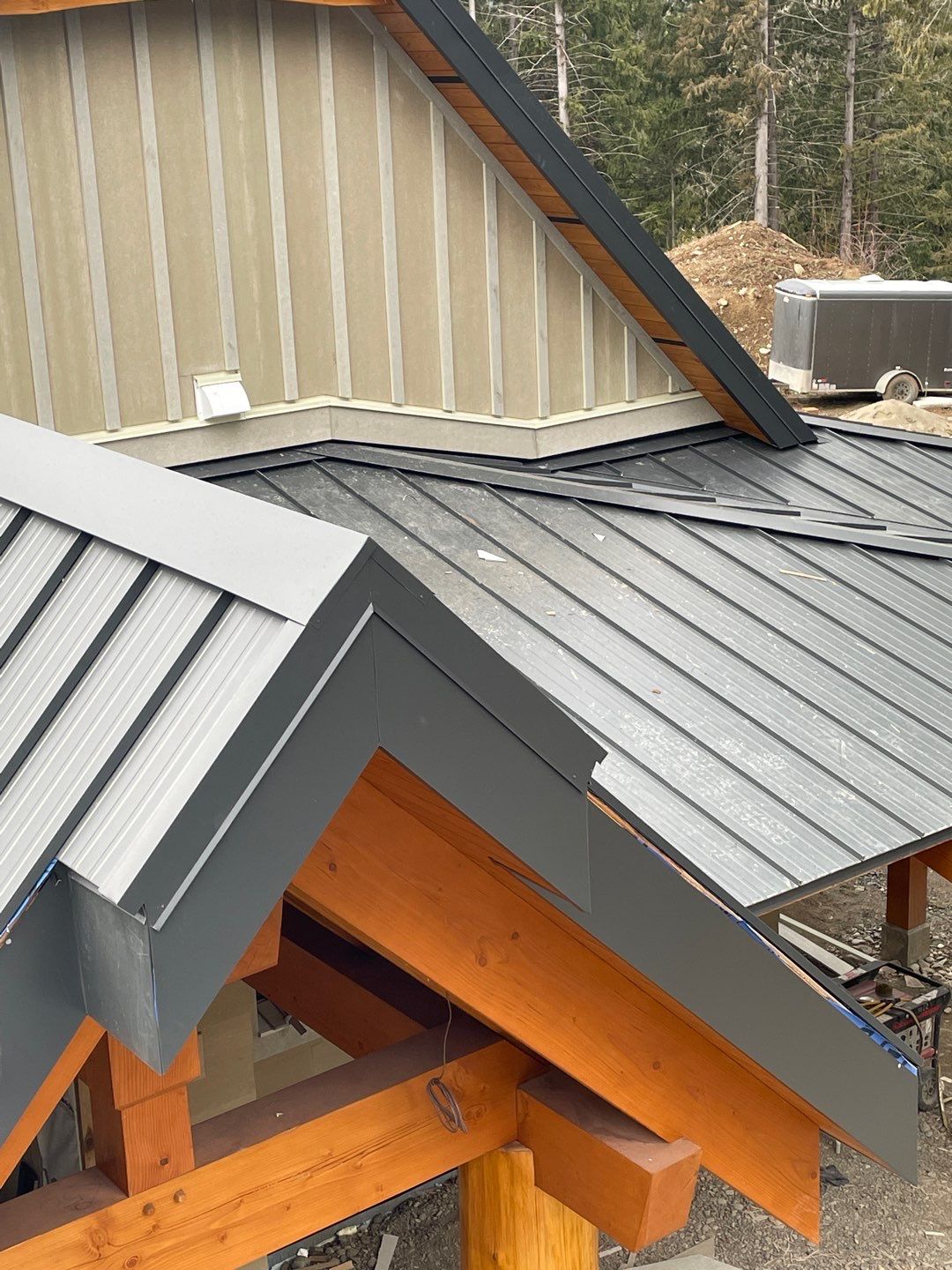 Residential Roofing Installation using 12" Prolok metal by Top Notch Roofing Inc