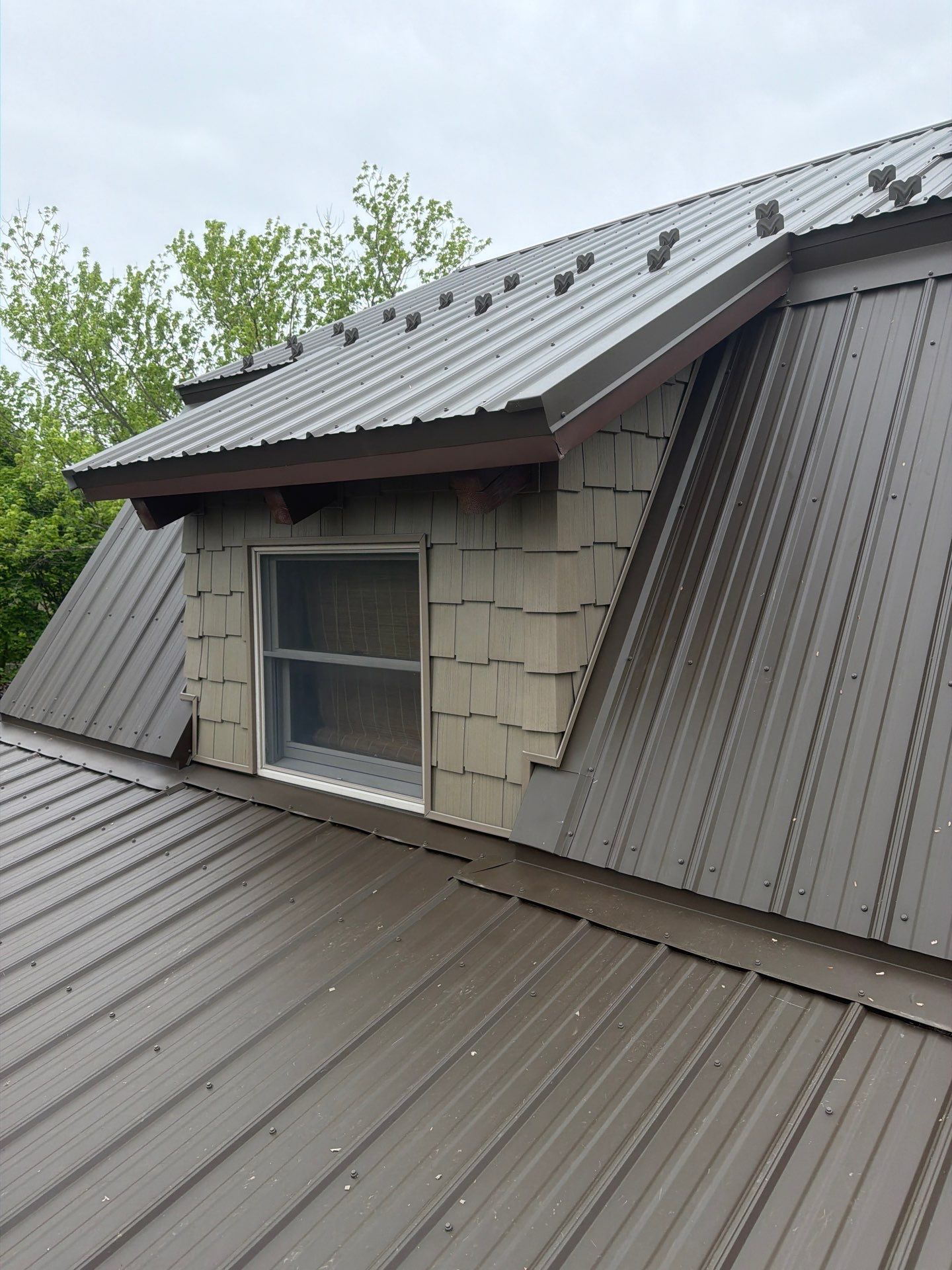 Textured Bronze ABM Metal Roof and Skylight Installation in Halifax by Esh Builders