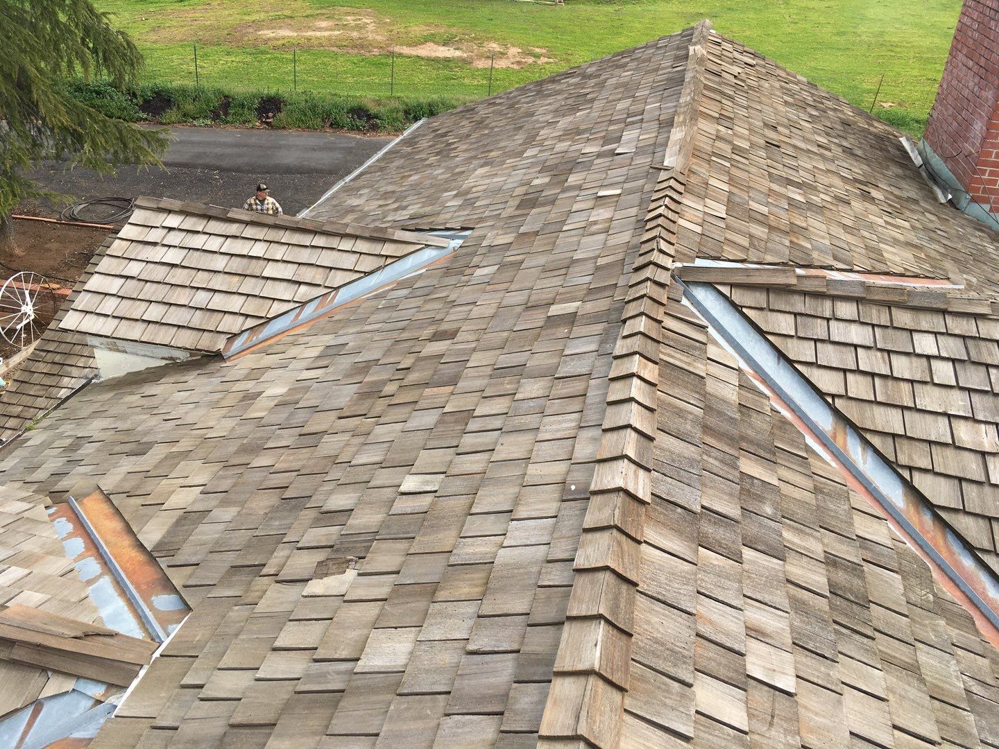 Residential Roofing Installation using Standing seam metal roofing system by Straight Edge Roofing Inc