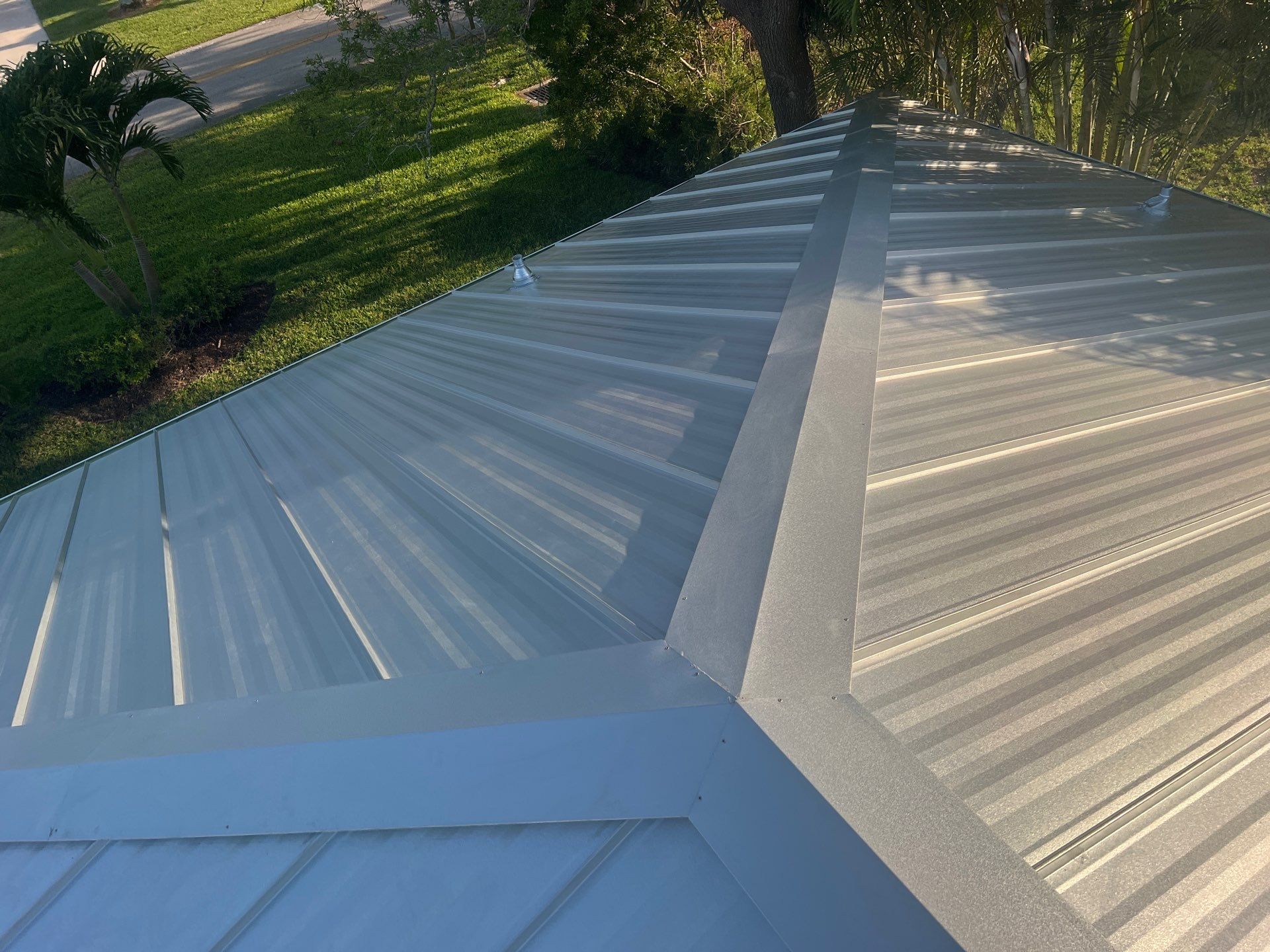 Residential Roofing Installation using Galvalume Standing Seam by Durabilis Roofing INC