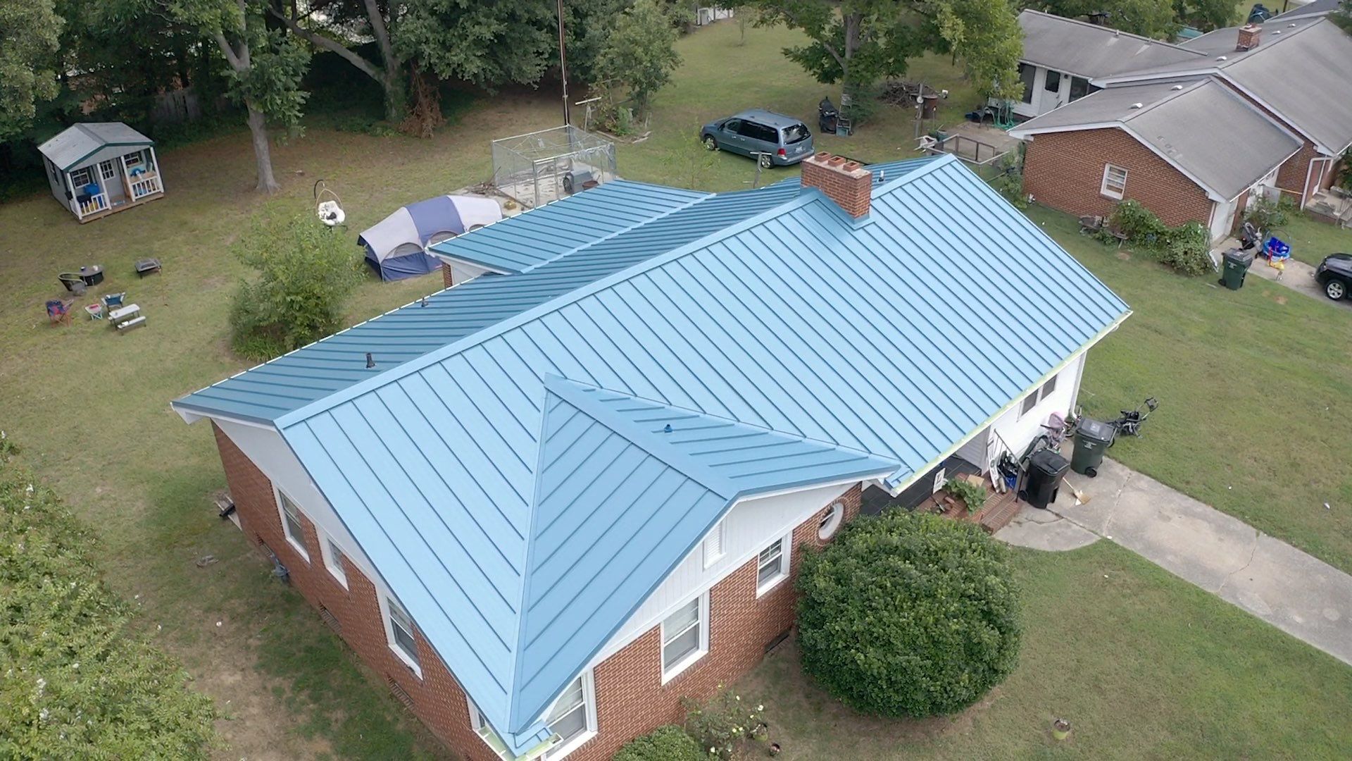 Carolina Blue Standing Seam Roof by Just In Time Roofing and Restoration