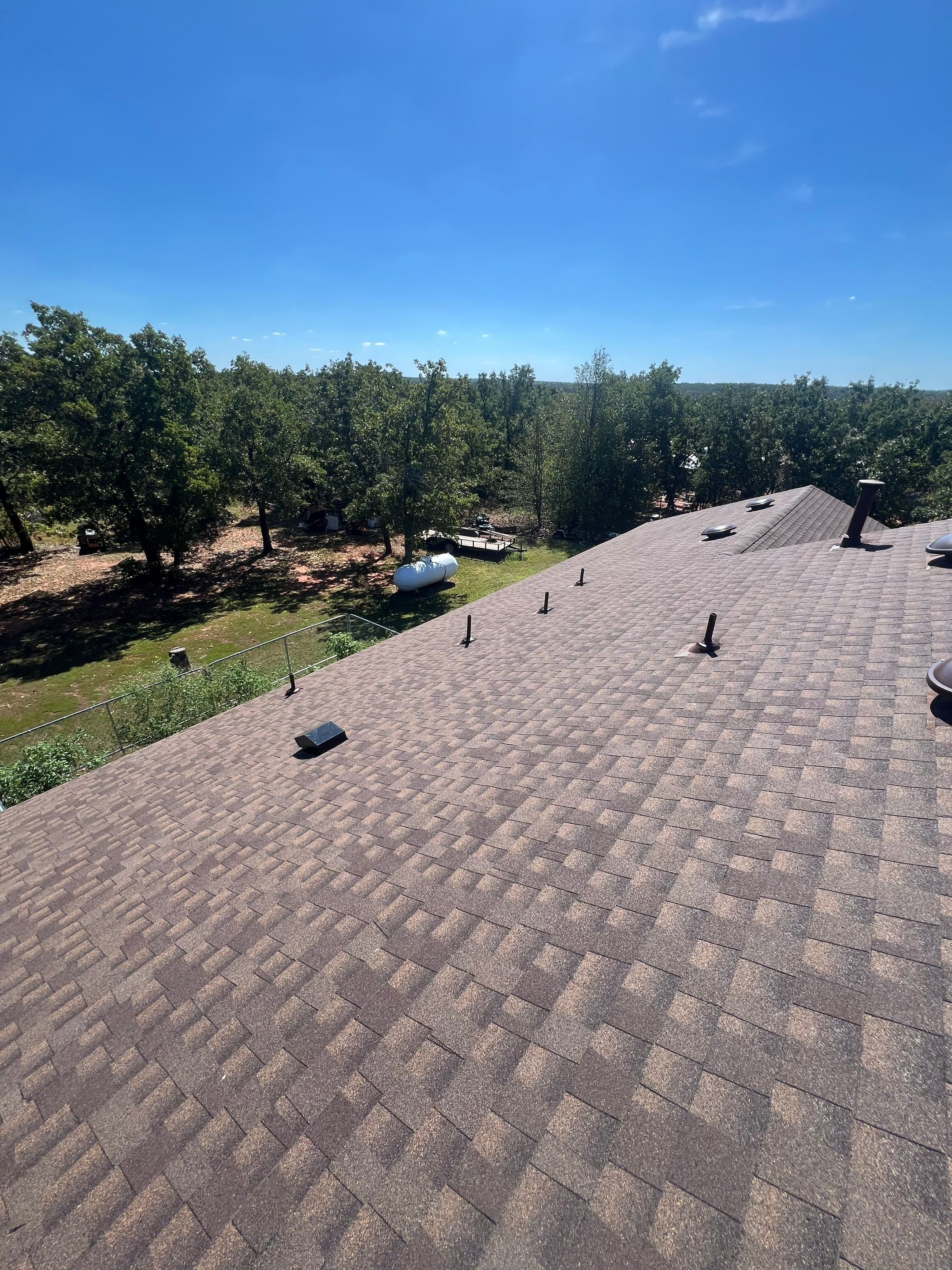 roof replacement in Luther by McCann's Roofing and Construction